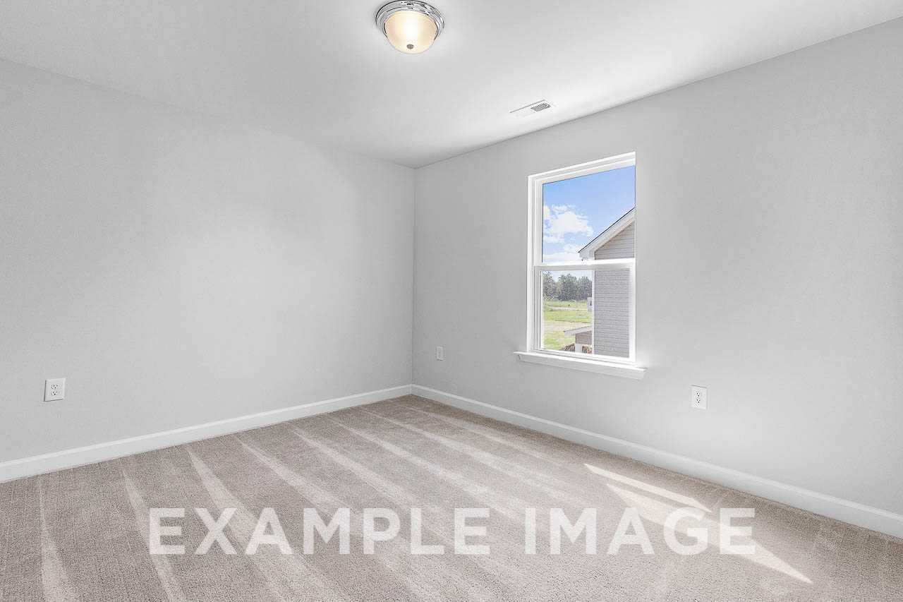 Davidson Homes The Chestnut Plan Bedroom Unfurnished with Window
