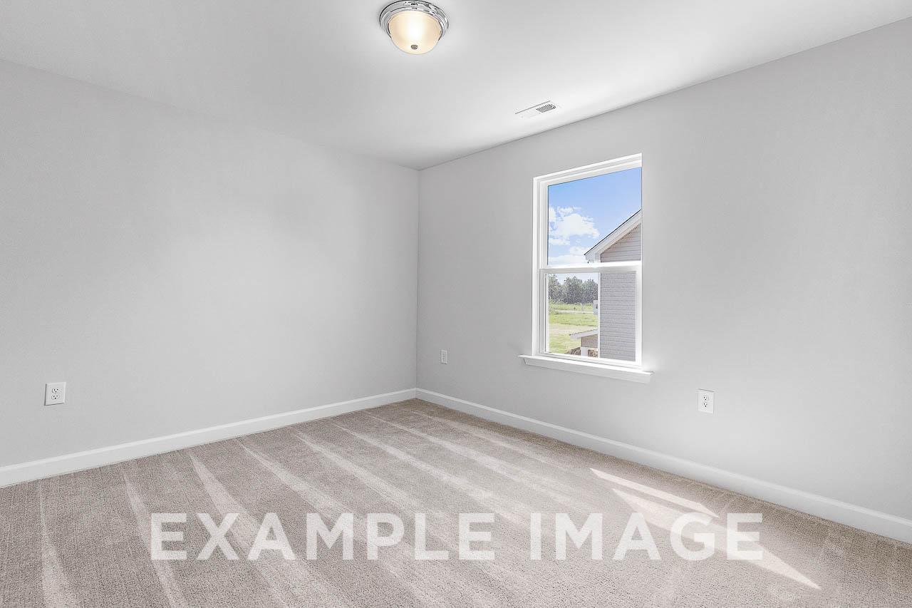 Davidson Homes The Chestnut Plan Bedroom Unfurnished with Window