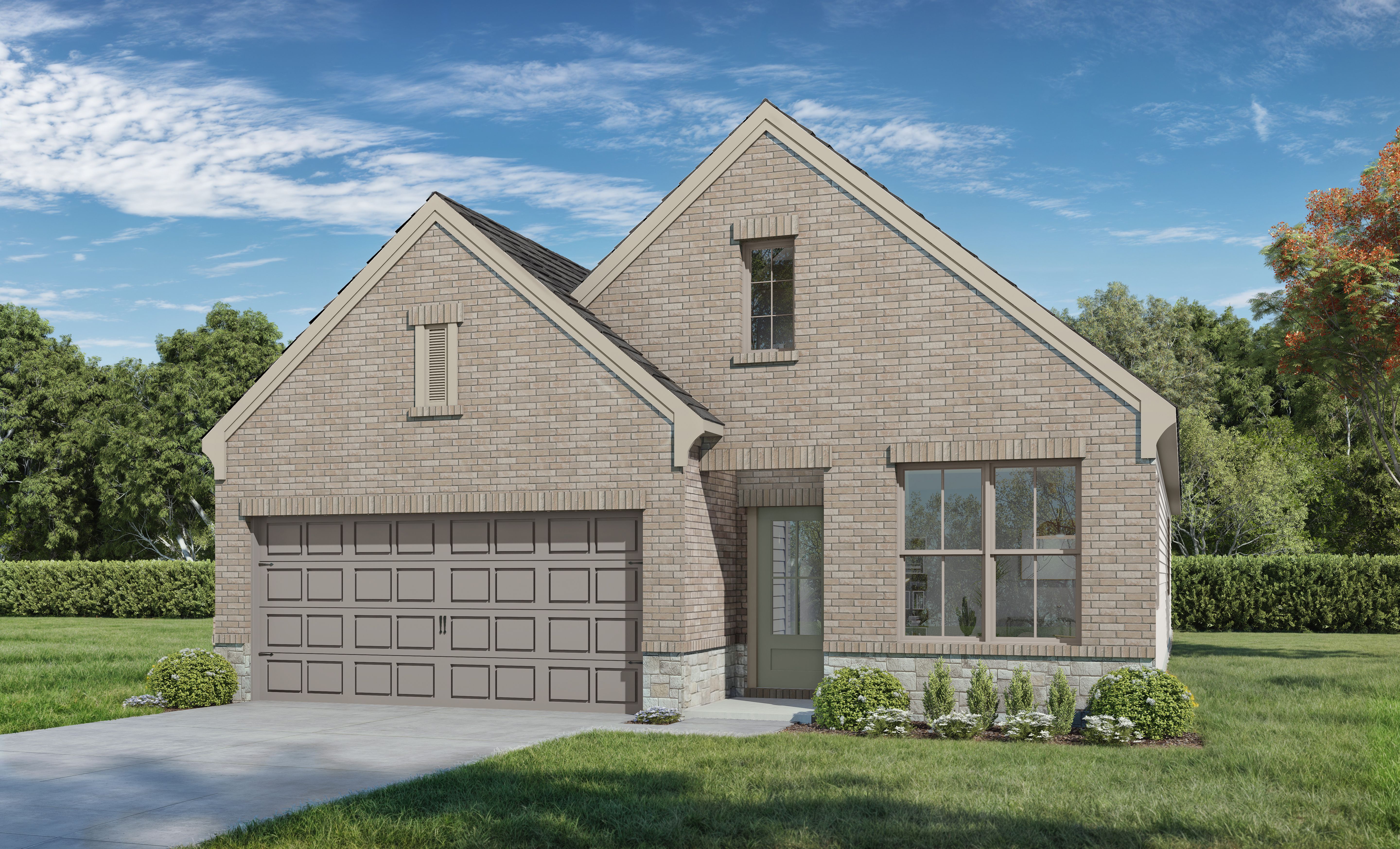 The Greenfield K elevation featuring a brick exterior, one-story design, and a two-car garage in Crosby, Texas.