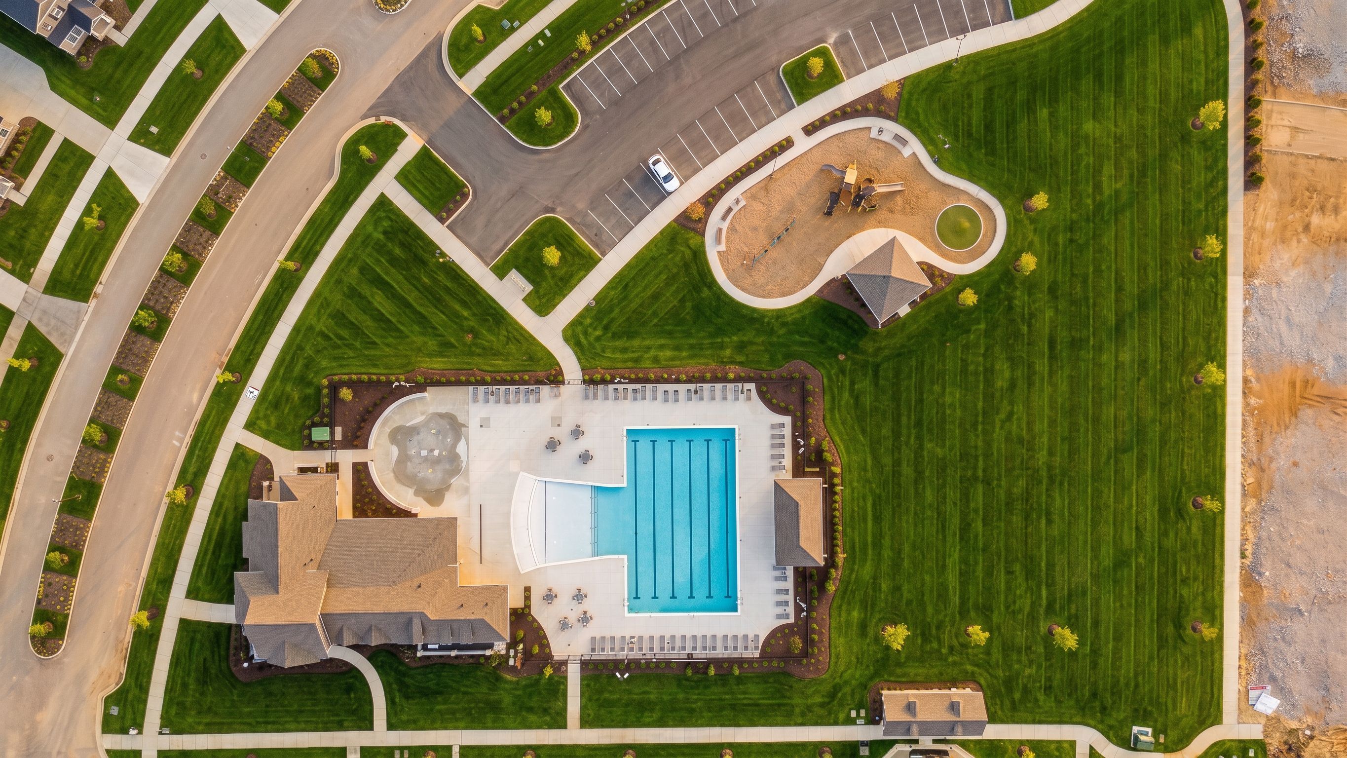 Aerial view of community swimming pool and playground at Bradshaw Farms in Mt. Juliet, TN by Davidson Homes.