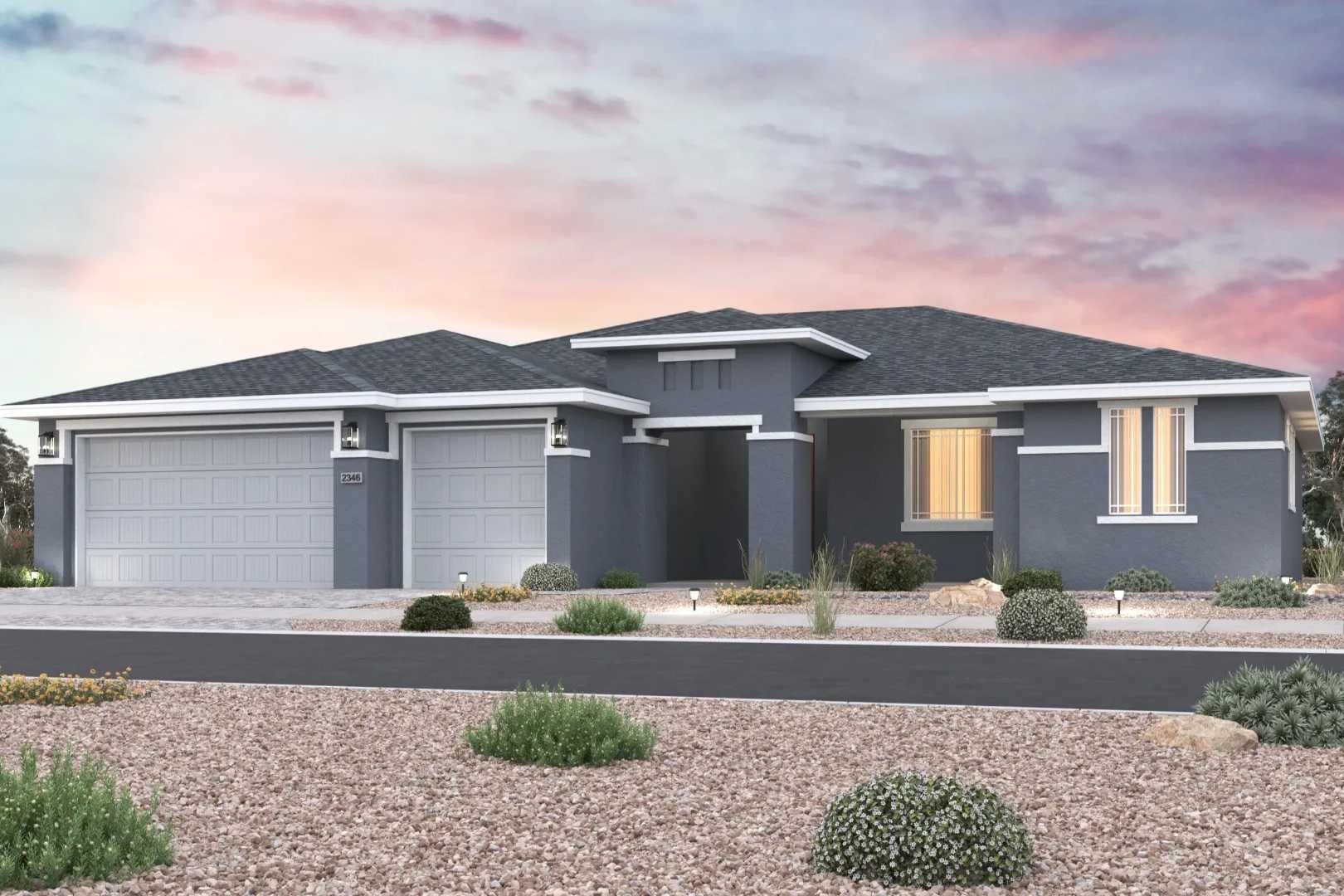 Contemporary gray modern home exterior in Morningstar Prescott Valley AZ by Evermore Homes with two-car garage and desert rock landscaping
