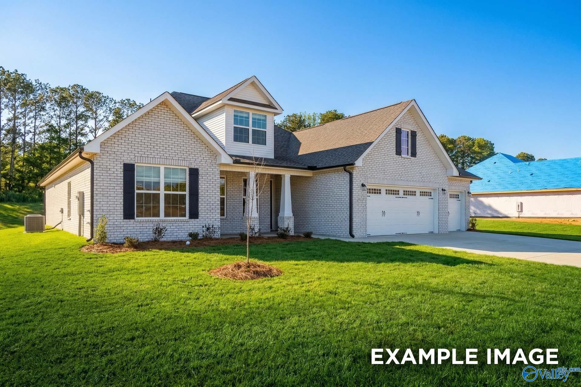 The Rockford floor plan by Davidson Homes, a 1.5-story, 3-car garage brick home for sale in Briercreek, Meridianville, AL.