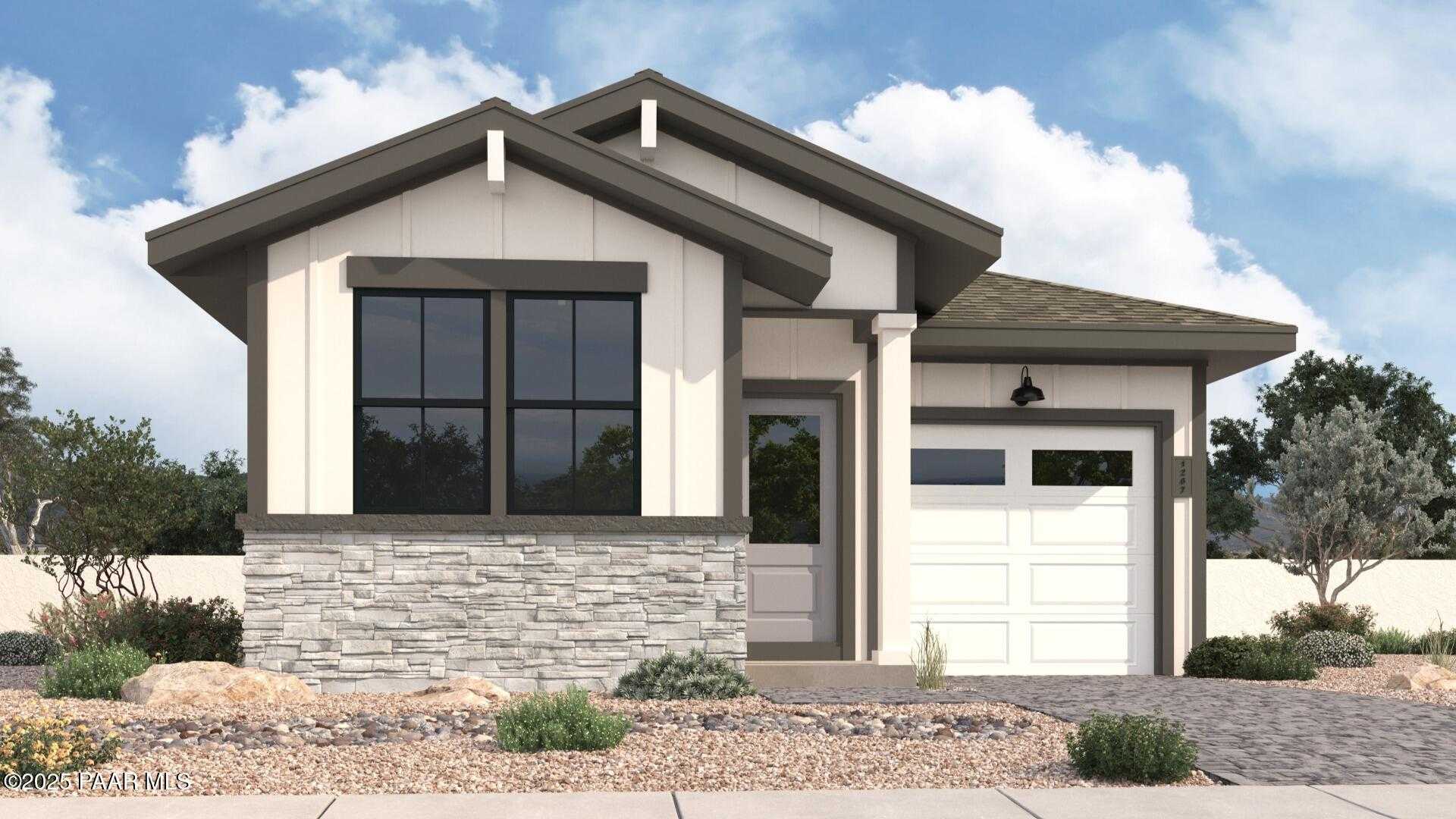Modern single-story 3-bedroom home with 2-car garage, gray siding, stone base, and desert landscaping in Prescott, Arizona - The Richmond B by Davidson Homes