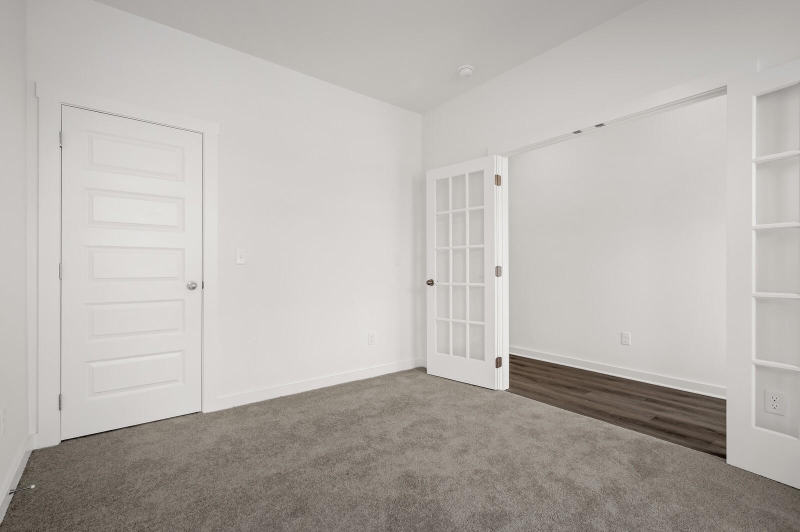 Flexible home office or study with French doors in The Logan C floor plan at Calista Farms, White House, Tennessee.