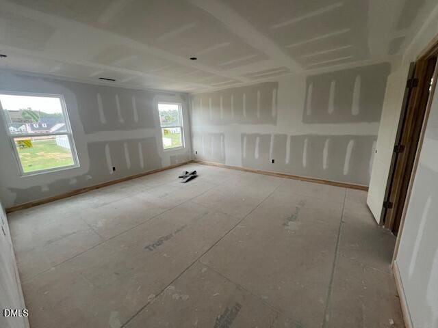 Unfinished bedroom under construction in The Hickory II C floor plan at Retreat at North Main in Lillington, NC.