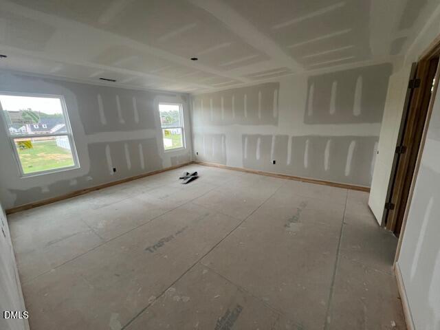 Unfinished bedroom under construction in The Hickory II C floor plan at Retreat at North Main in Lillington, NC.