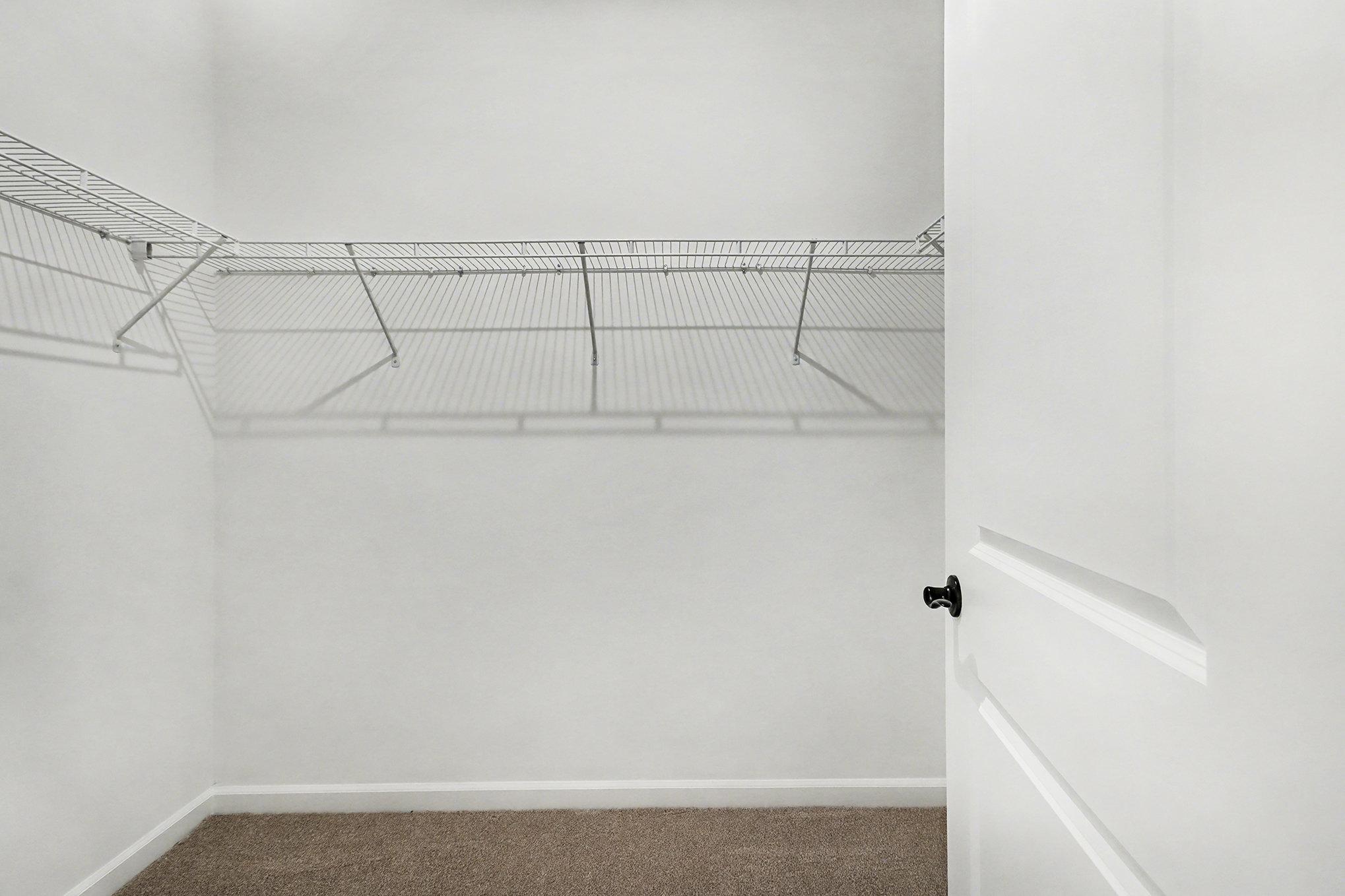 Luxurious master suite closet in Davidson Homes The Daphne B, Loganville, GA