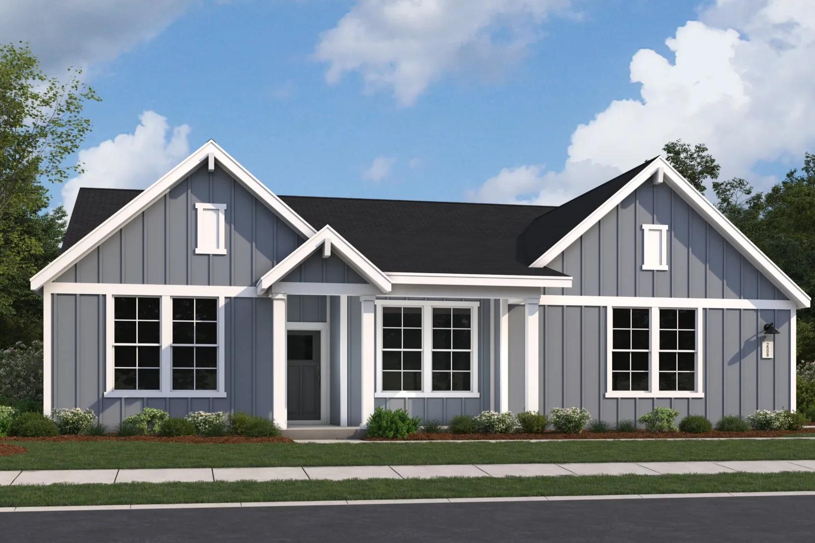 The Arcadia 4-bedroom single-story home elevation with gray board-and-batten siding, gabled roof, front porch, and lush landscaping