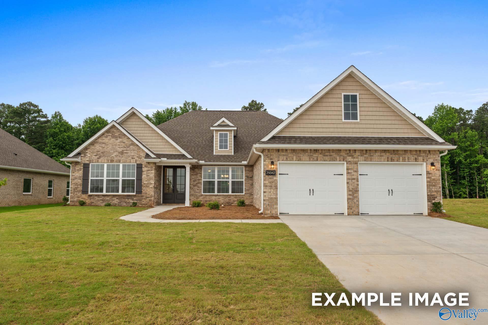 Modern 3-bedroom, 2.5-bath The Finleigh home with brick accents, 2-car garage, and landscaped yard in Briercreek, Meridianville, Alabama