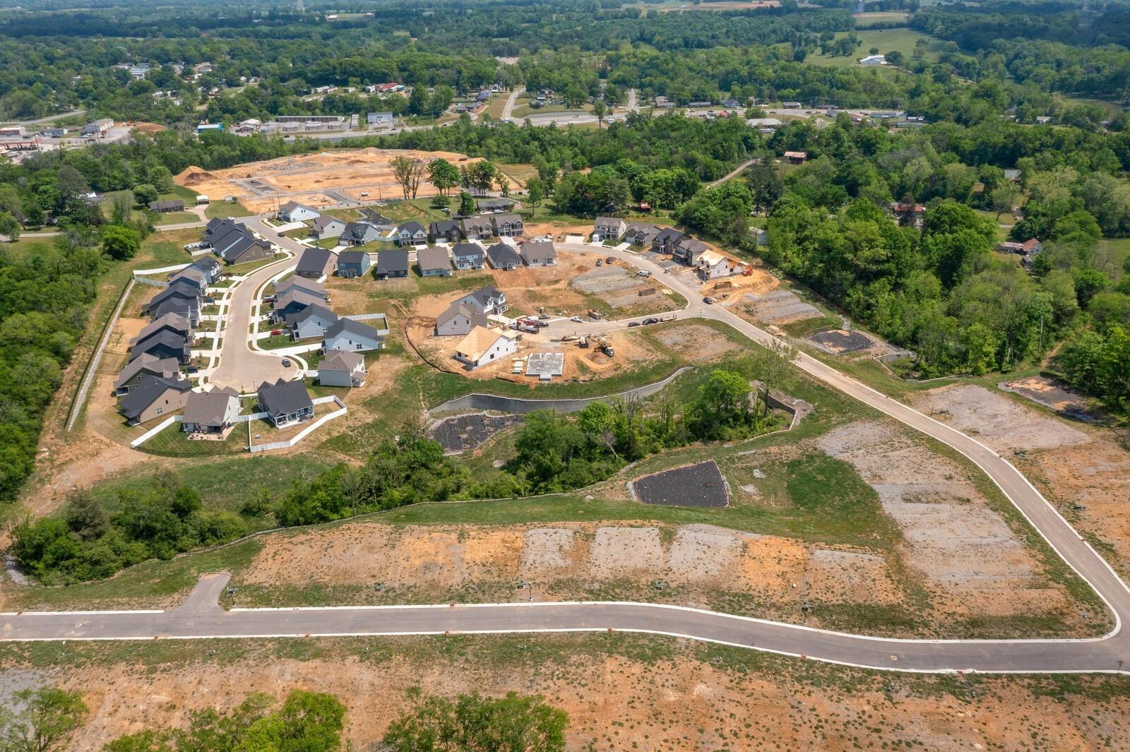 Aerial view of Woods Crossing residential community construction site in Gallatin, Tennessee by Davidson Homes.