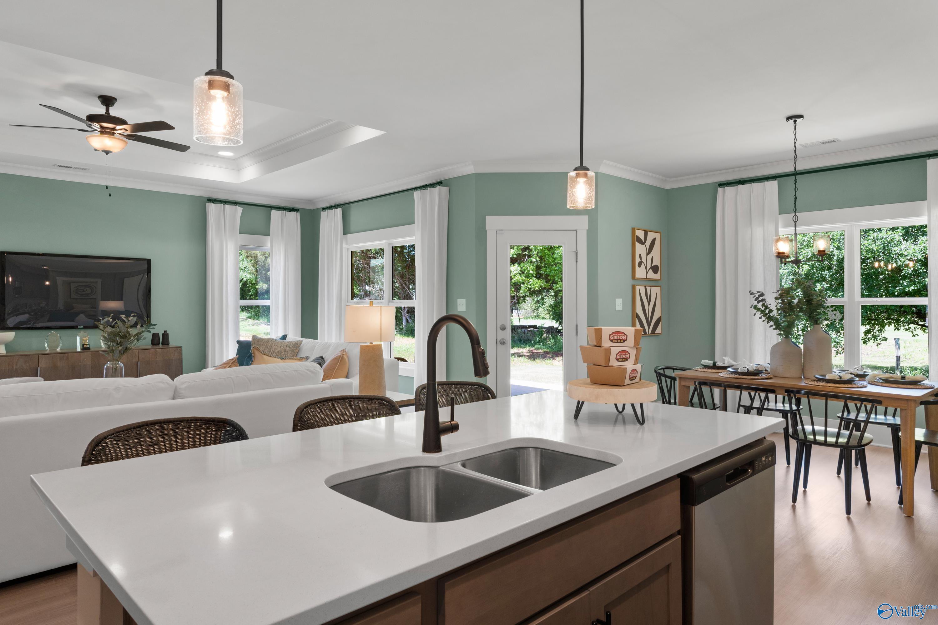 Open-concept kitchen and living room in The Franklin floor plan at Hollon Meadow, Decatur, Alabama.