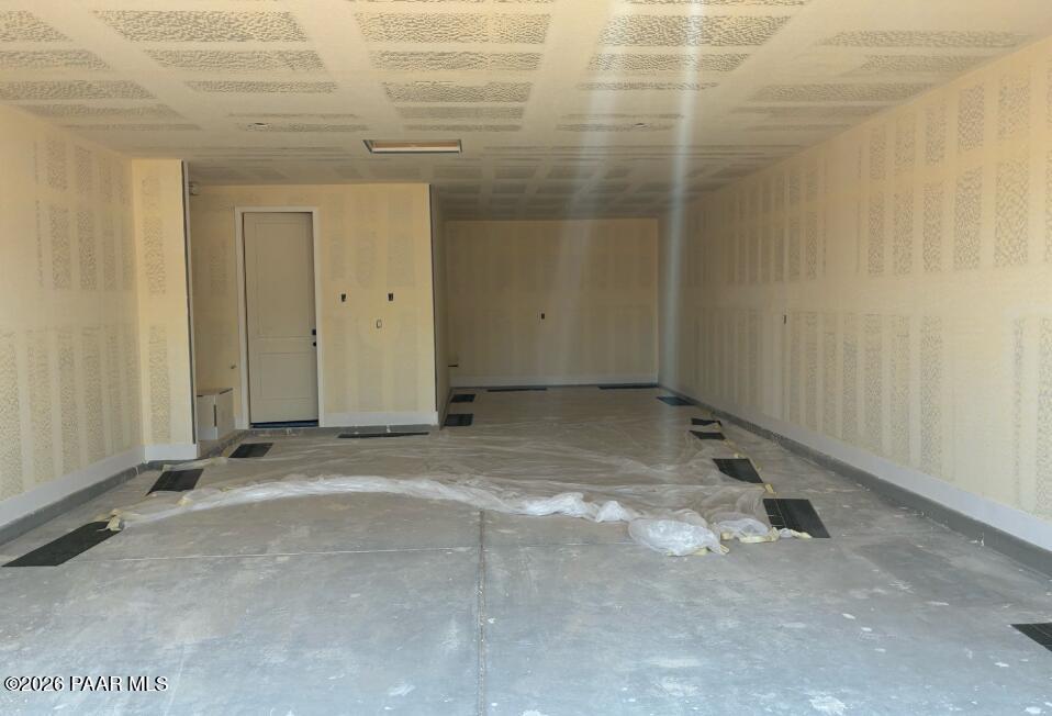 Spacious 3-car garage under construction in The Durango II G floor plan at South Ranch Western Collection, Prescott, Arizona.