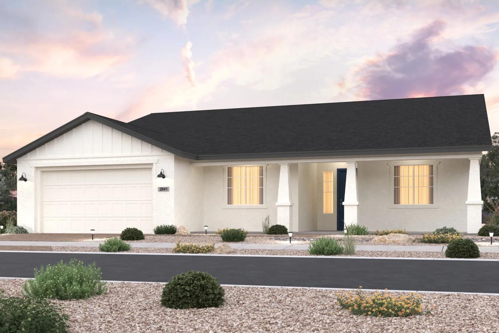 Modern single-story exterior of The Sunrise II B with white siding, black roof, 2-car garage, and desert landscaping at sunset in Prescott, AZ