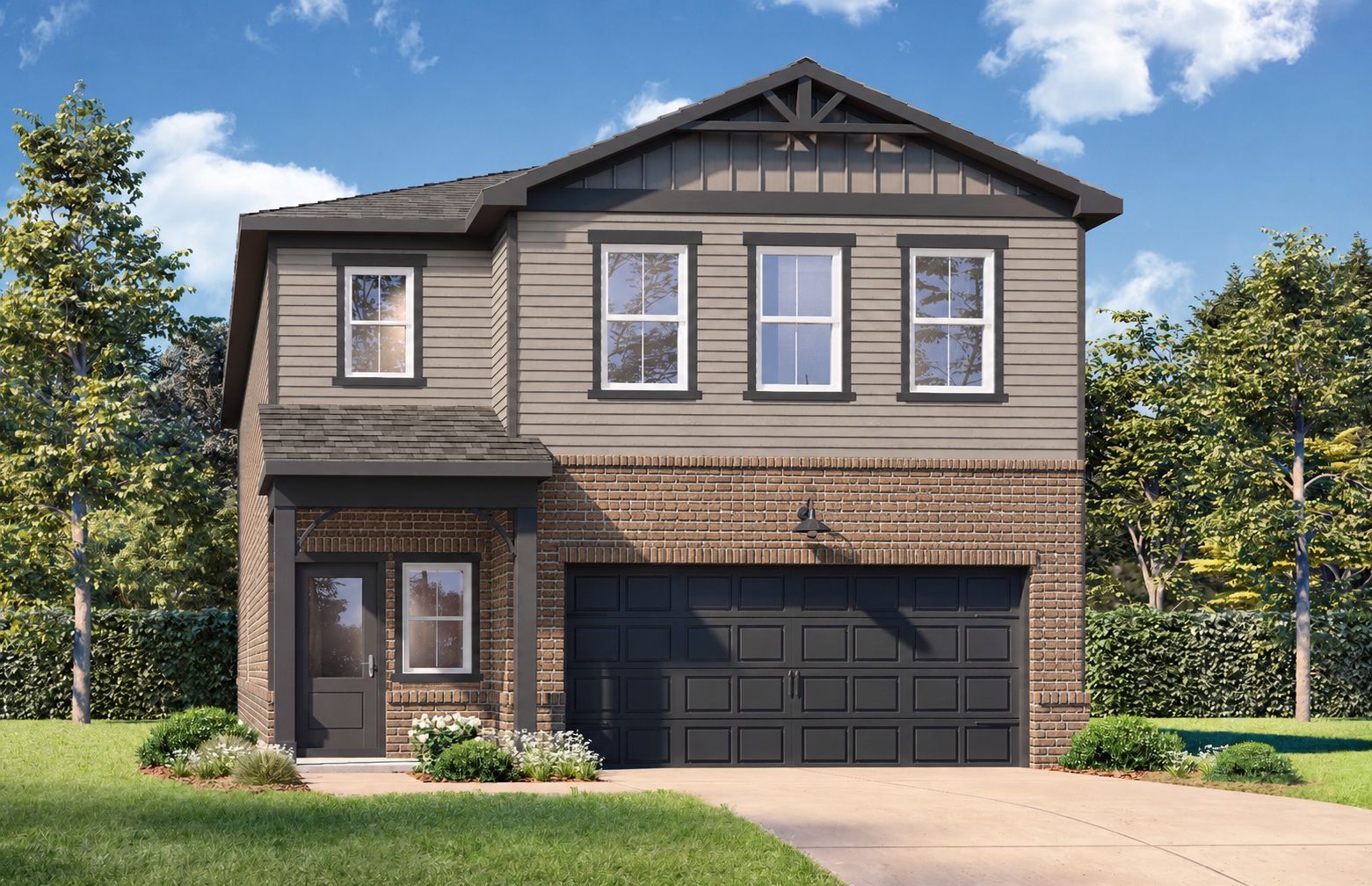 Craftsman style exterior of The Sinclair C by Davidson Homes, featuring brick accents and a two-car garage in Cartersville.