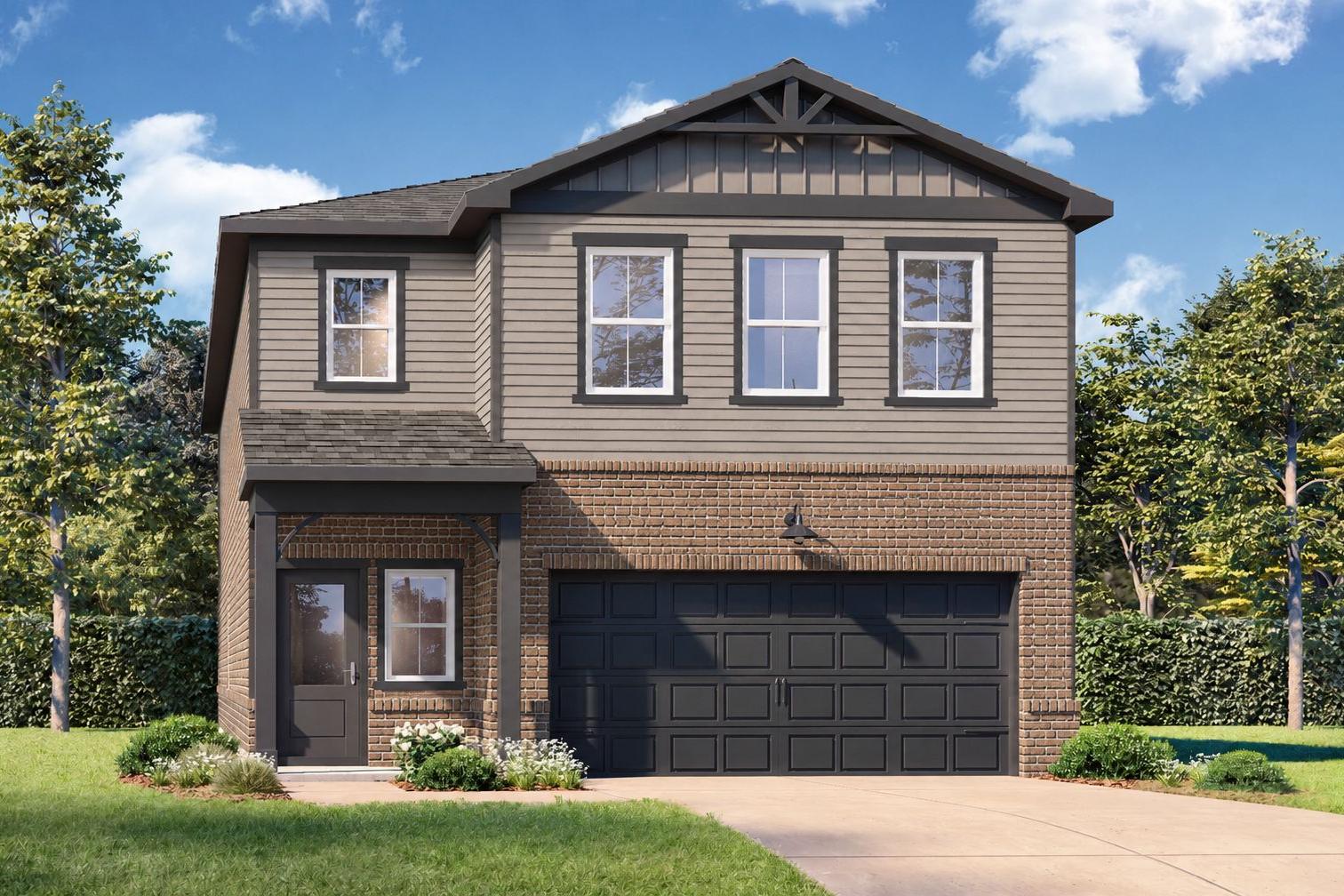 Craftsman style exterior of The Sinclair C by Davidson Homes, featuring brick accents and a two-car garage in Cartersville.