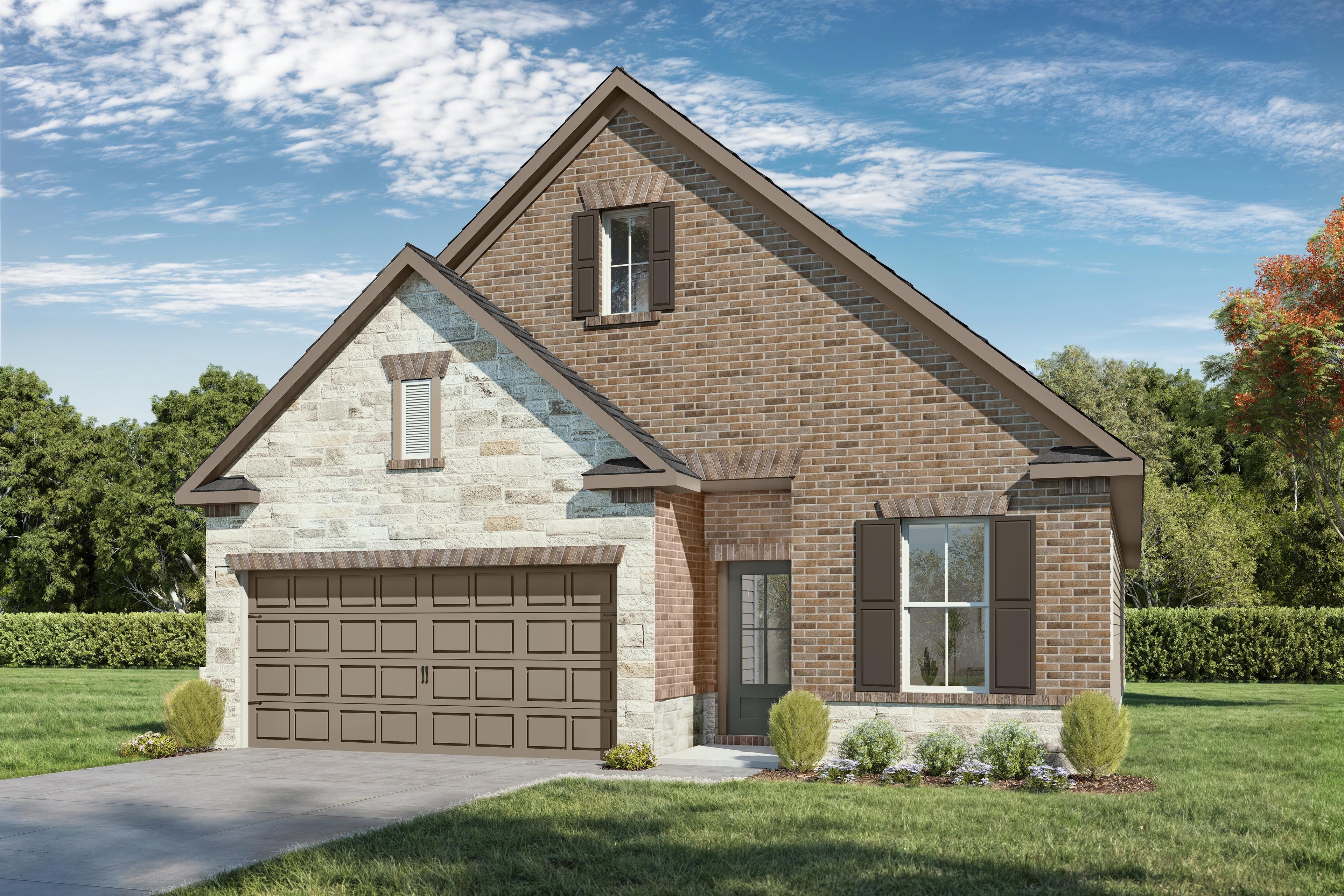 One-story Greenfield home elevation featuring a classic brick and stone exterior with a two-car garage in Crosby, Texas.