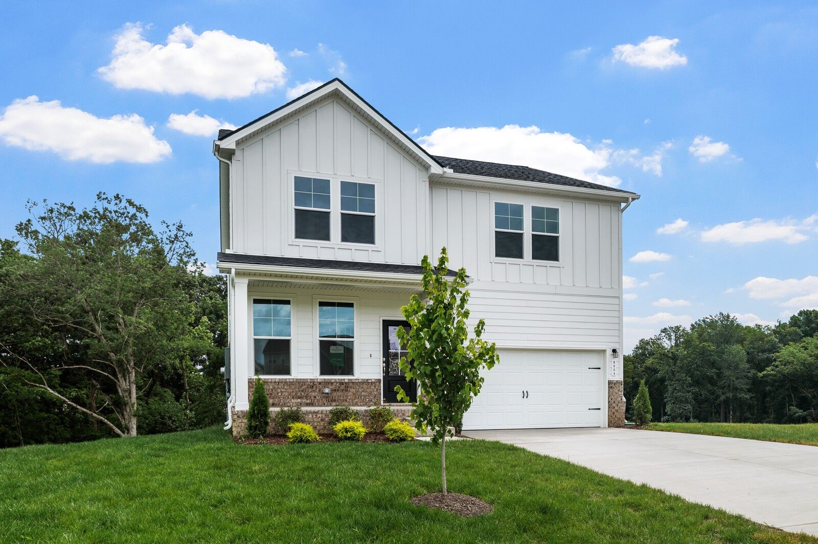 Two-story, 3-bedroom The Logan C home by Davidson Homes with a 2-car garage in Calista Farms, White House, Tennessee.