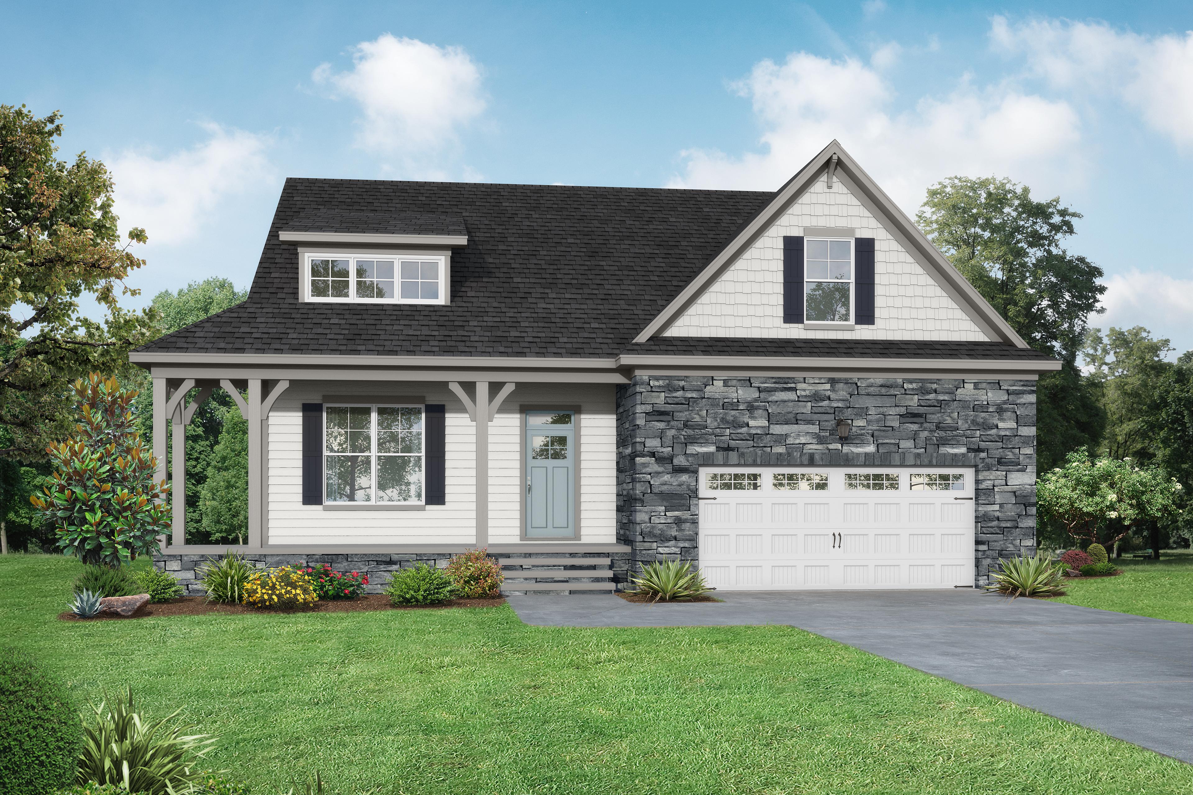 Two-story The Cypress II facade with stone accents, beige siding, front porch, two-car garage, and lush landscaping