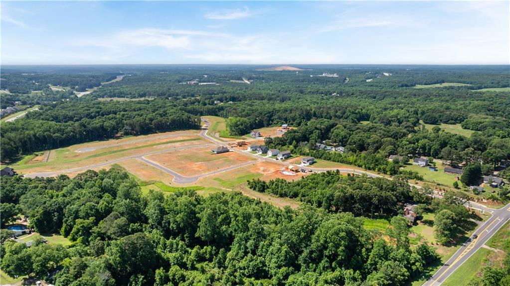 Aerial view of Cedar Farms community development by Davidson Homes in Winder, Georgia featuring new home construction sites.