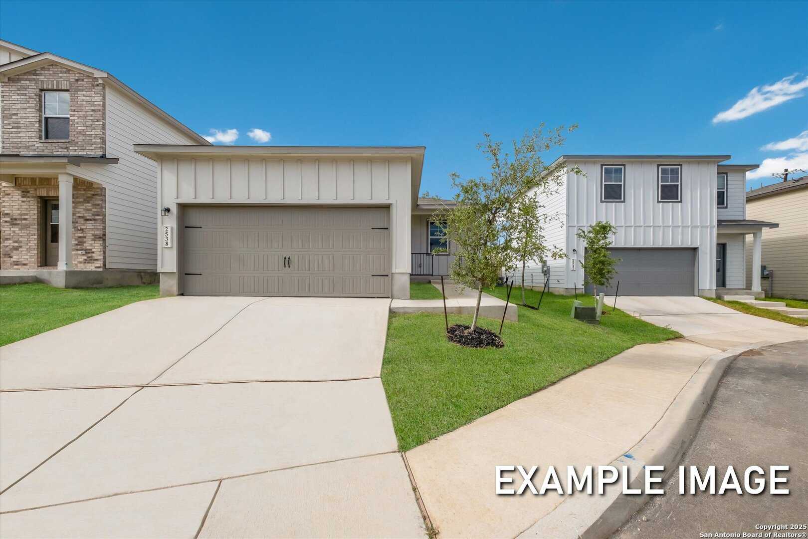 Modern single-story 3-bedroom home with 2-car garage, brick accents, driveway, and landscaped yard in Agave, San Antonio, Texas