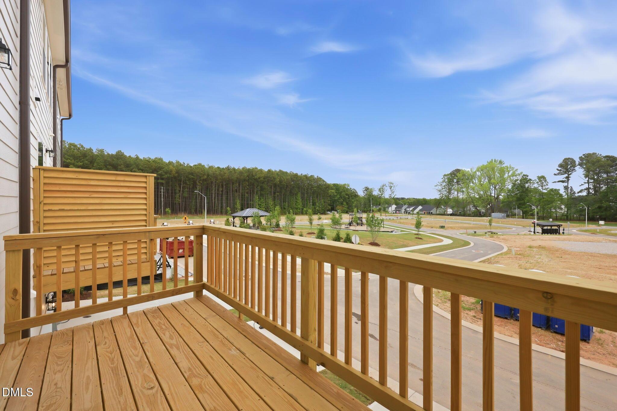 Wood deck balcony overlooking the neighborhood development in Camden Park, Knightdale, North Carolina.