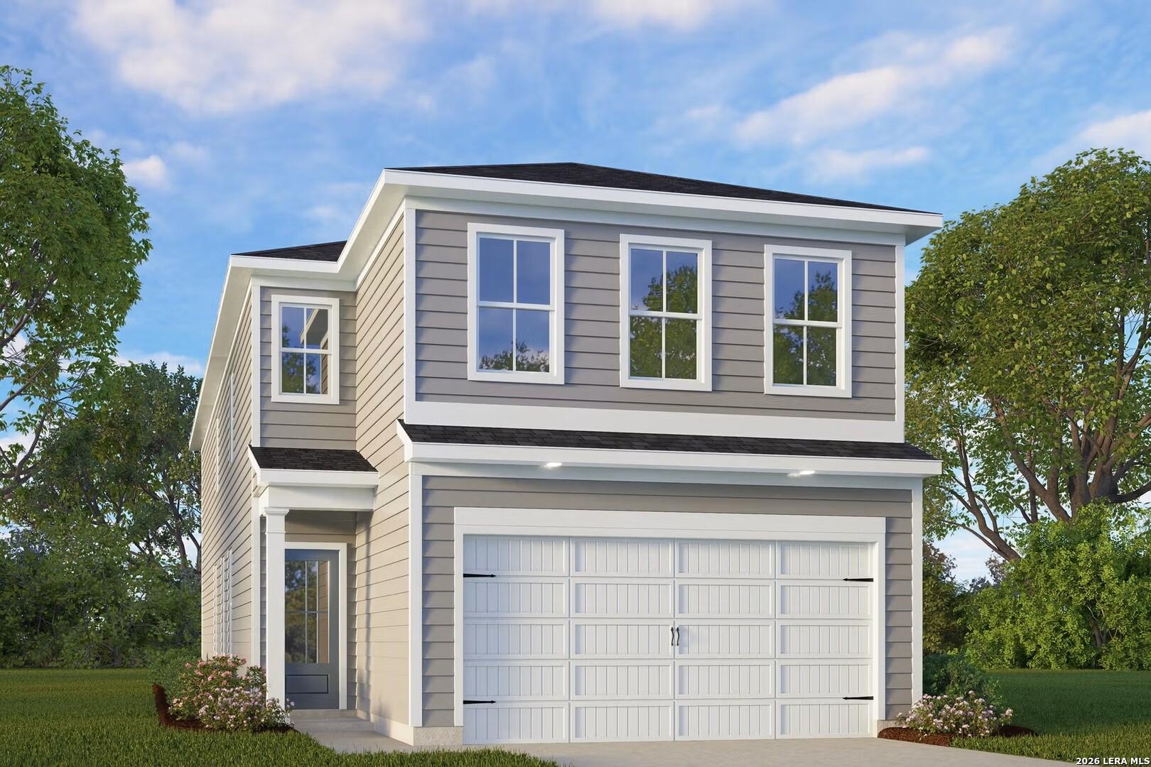 Modern two-story gray home with white 2-car garage, large windows, and landscaped yard in Cedar Heights, San Antonio, Texas - Davidson Homes The Gillian A