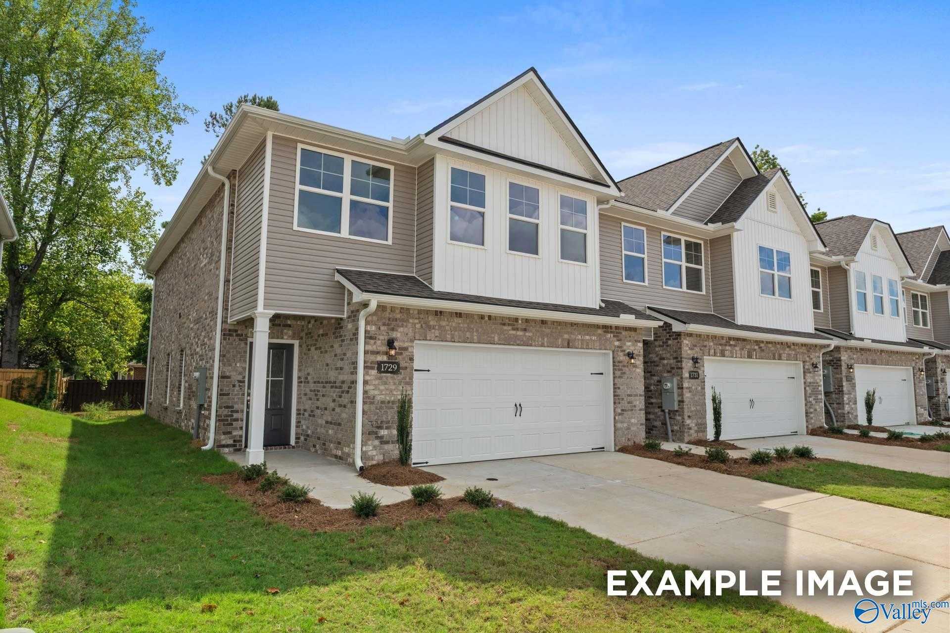 Modern 2-story The Camden home by Davidson Homes: beige siding, brick accents, 2-car garage, landscaped yard in Pavilion, Huntsville, AL