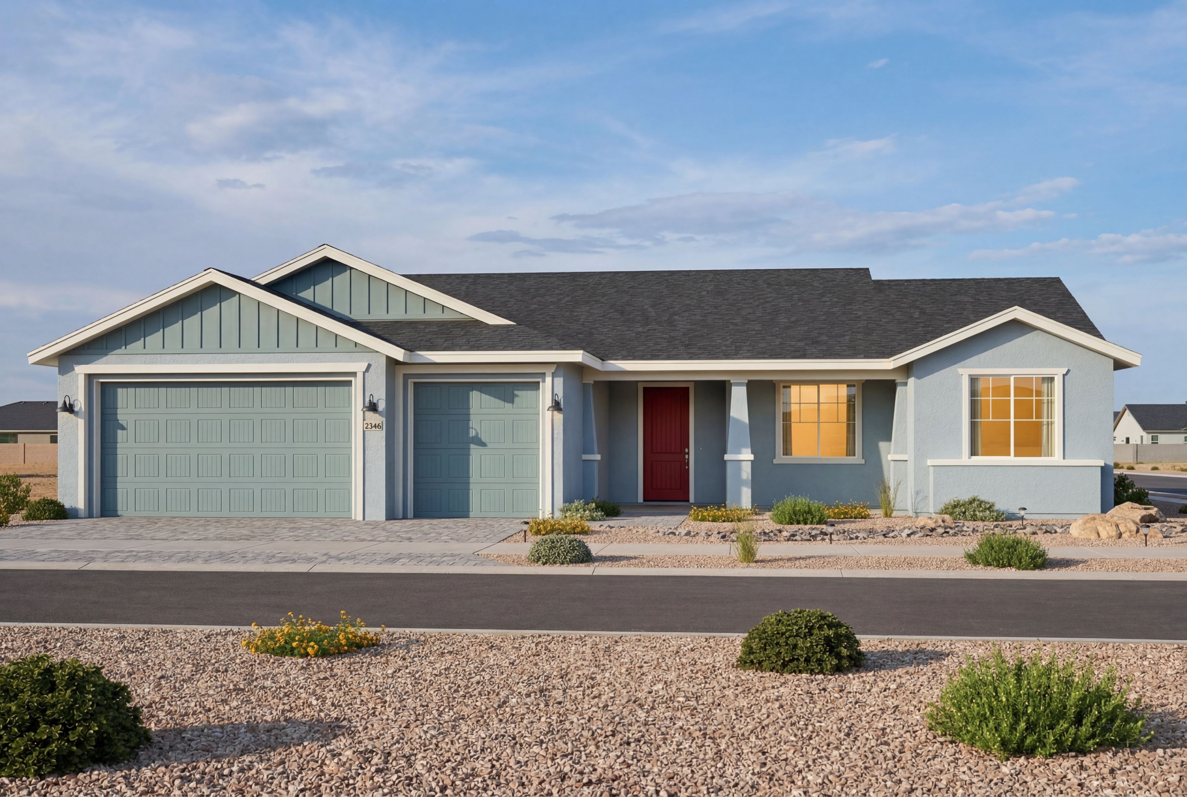 The Monarch single-story home in Prescott Valley, AZ featuring a 3-car garage and vibrant red front door.