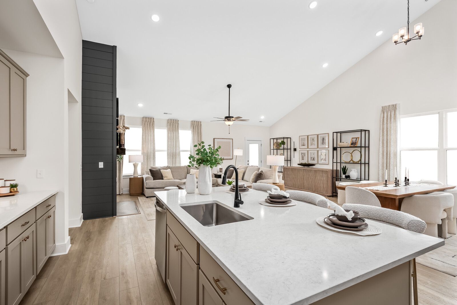 Spacious open-concept kitchen and living area in The Ridgeport E by Davidson Homes, featuring quartz island, high ceilings, Mt. Juliet TN