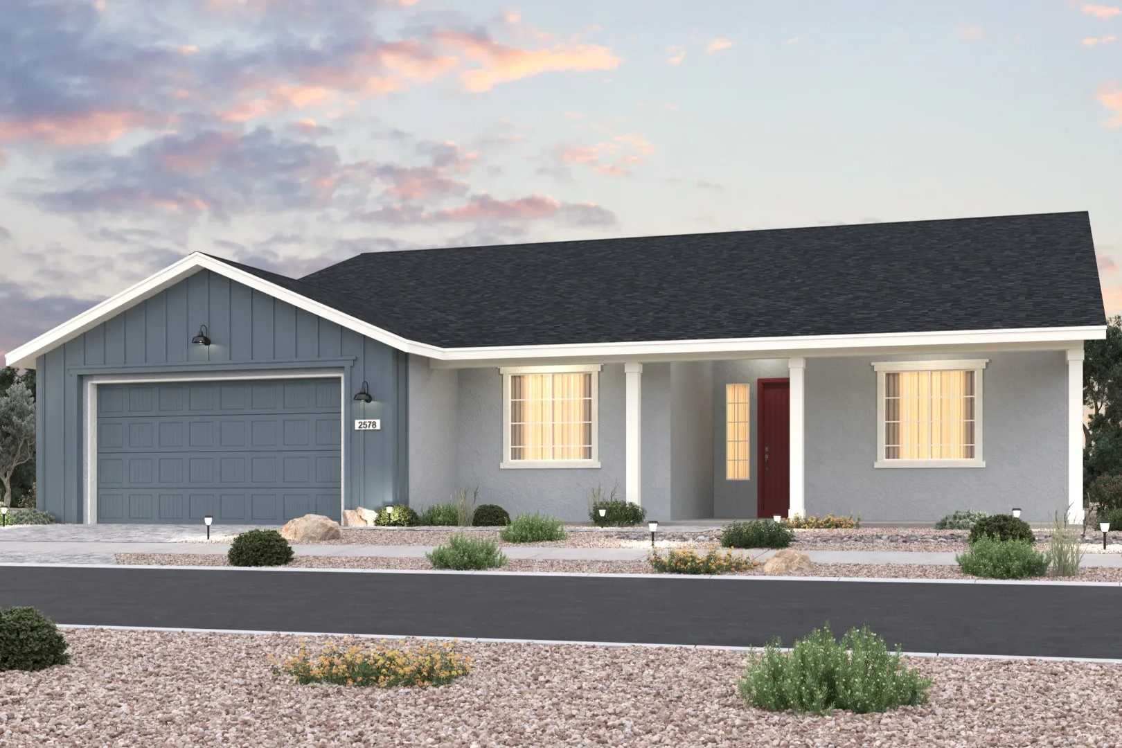 Modern single-story home exterior in Morningstar Prescott Valley AZ by Evermore Homes with blue siding, red door, and desert landscaping at sunset