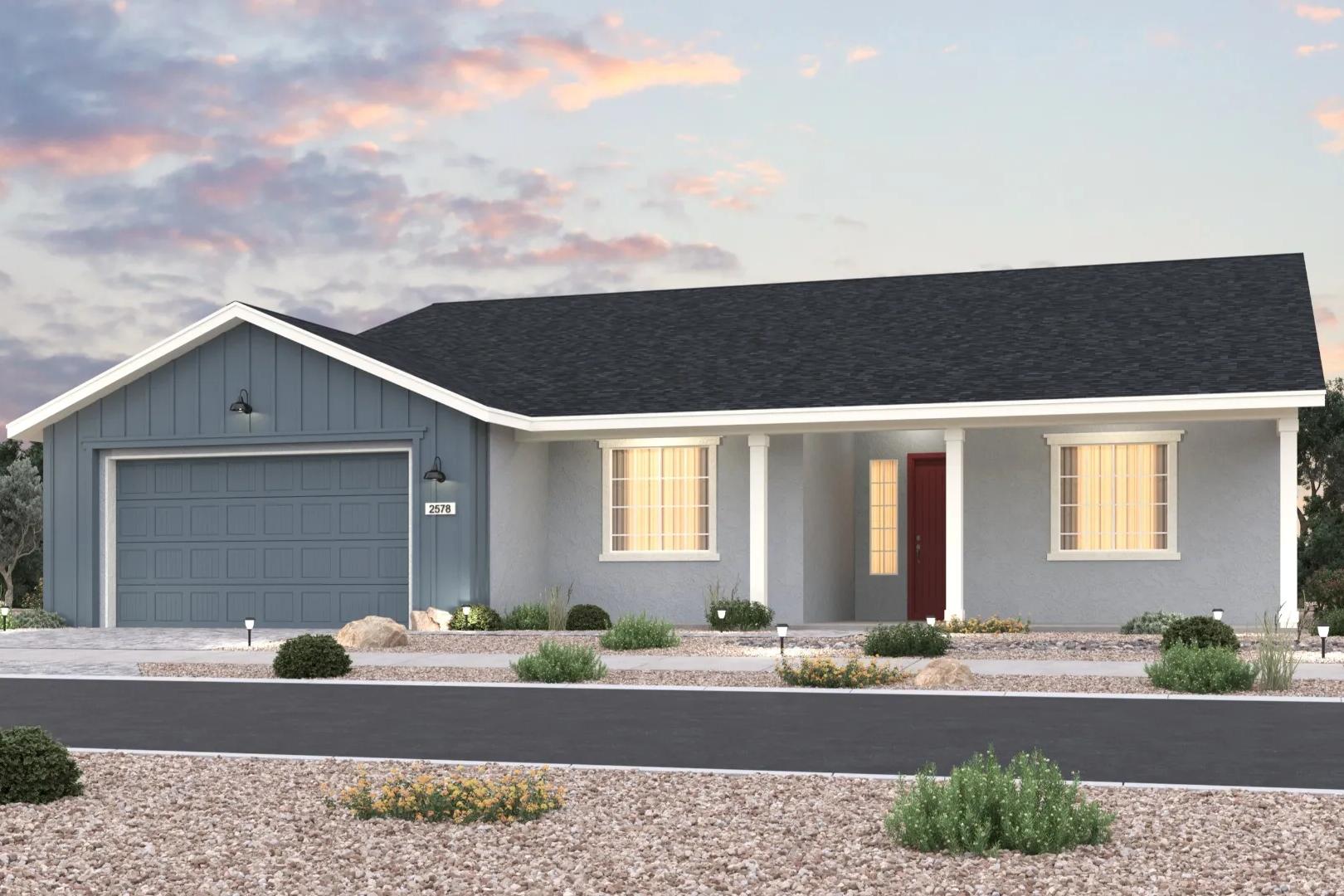 Modern single-story home exterior in Morningstar Prescott Valley AZ by Evermore Homes with blue siding, red door, and desert landscaping at sunset