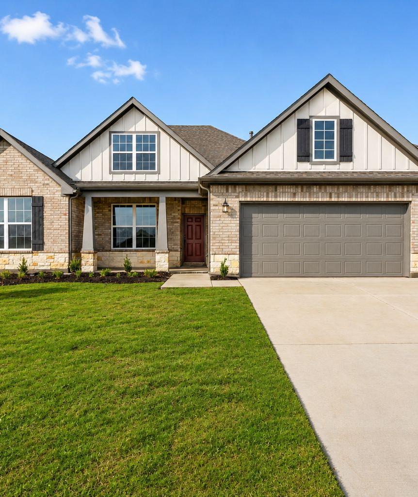 Open-concept kitchen at Waverly Estates in Josephine TX with white shaker cabinets, quartz counters, subway tile backsplash, hardwood floors, and dining area