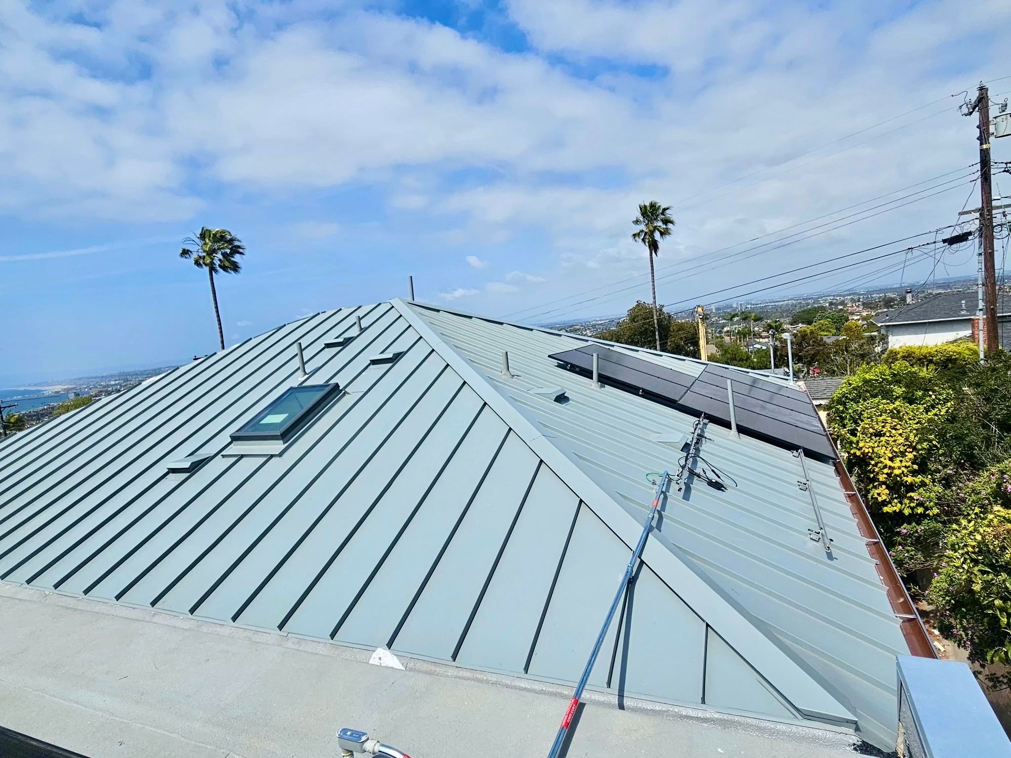 Metal Roof, Custom Gutters & Skylight Installation