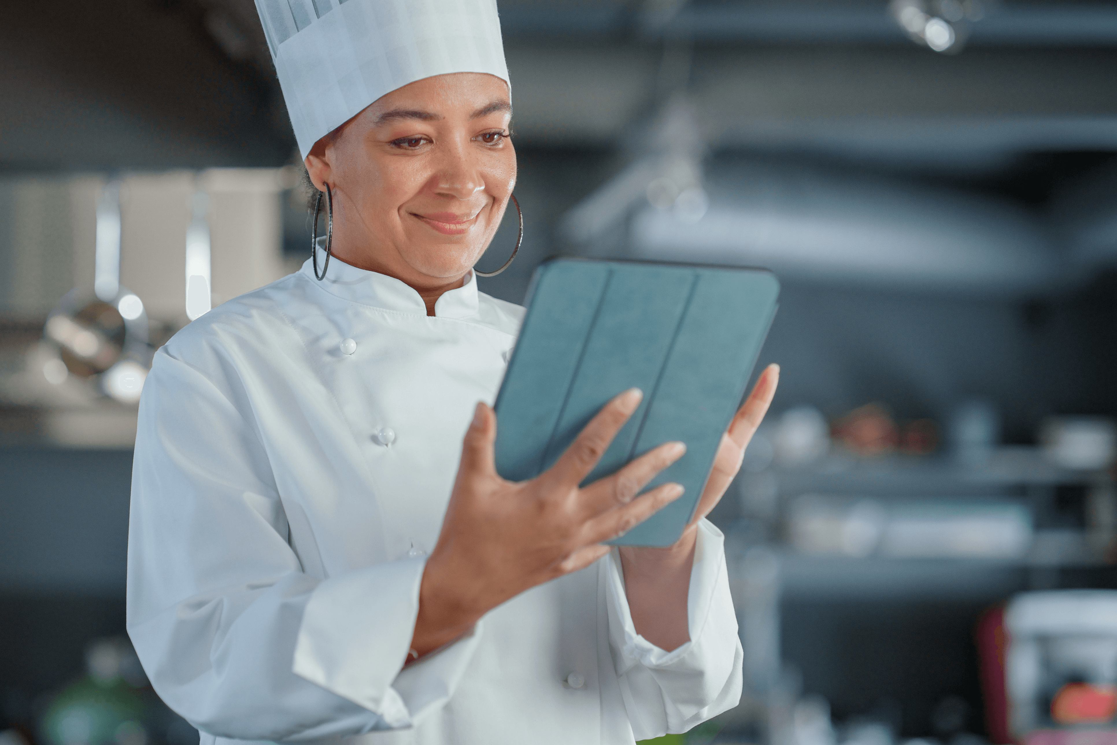 Chef using a tablet - restaurant reporting and analytics - SkyTab