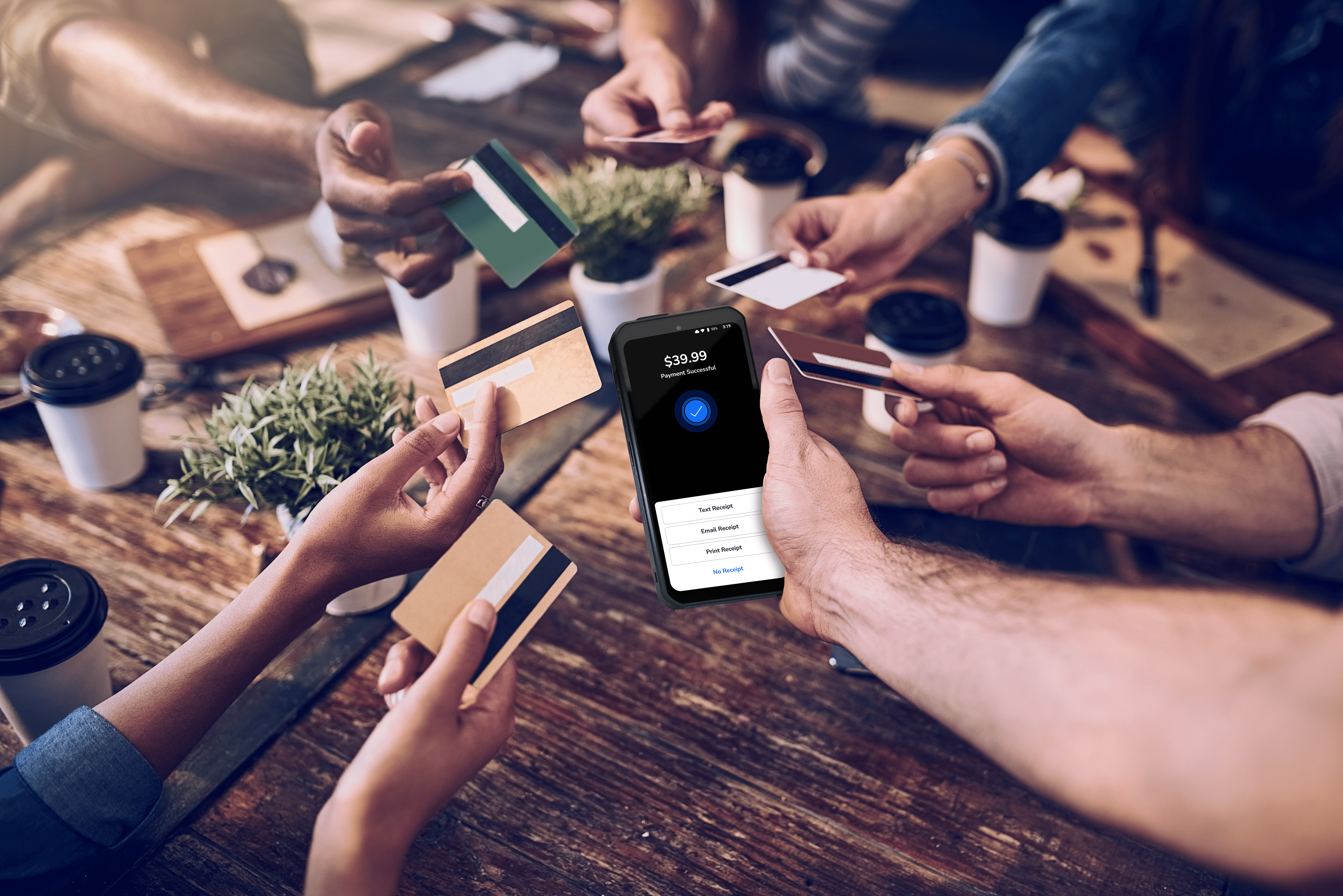 People holding out their credit cards to pay on a SkyTab Air handheld POS device - mobile ordering and payments - SkyTab