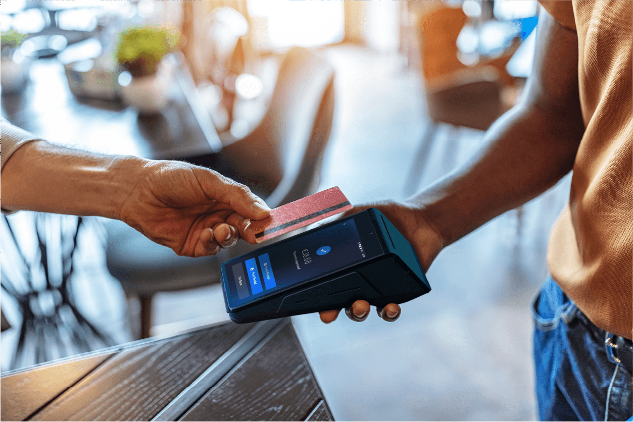 Customer paying with a credit card using a SkyTab Solo POS device - mobile ordering and payments - SkyTab
