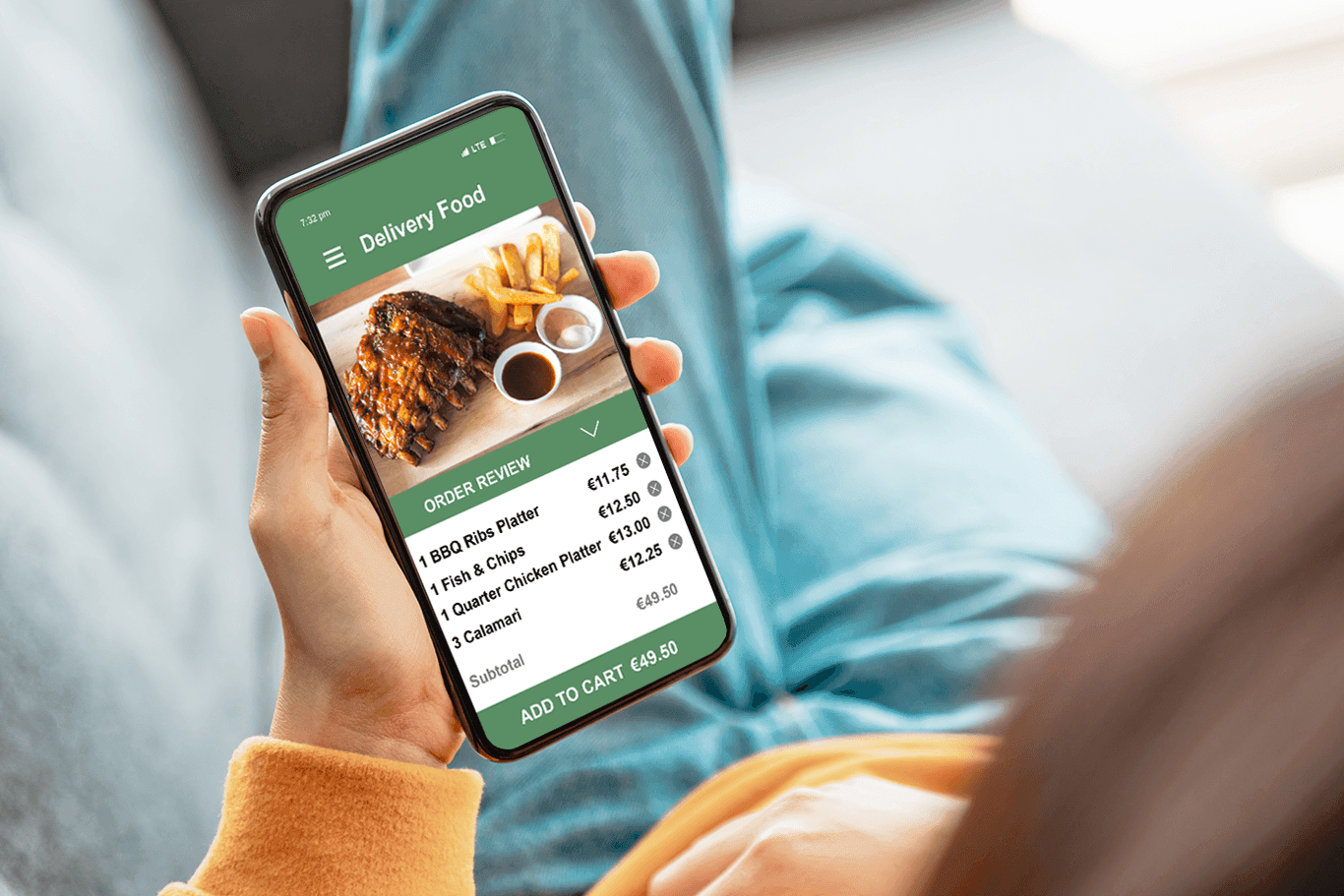 Person holding a smartphone showing a food order delivery screen - table service POS system - SkyTab