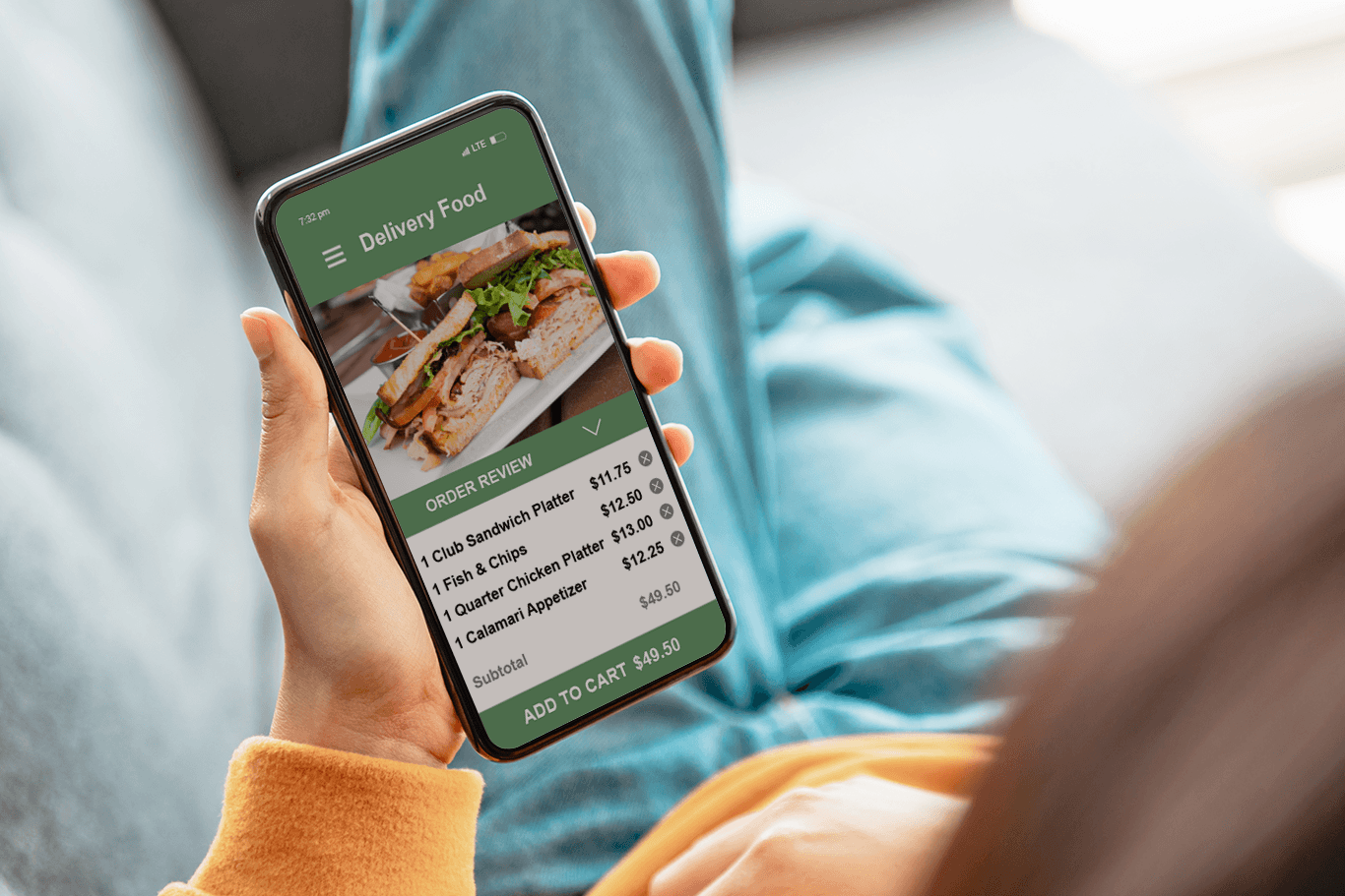 Person holding a smartphone showing a food delivery order - full service POS system - SkyTab