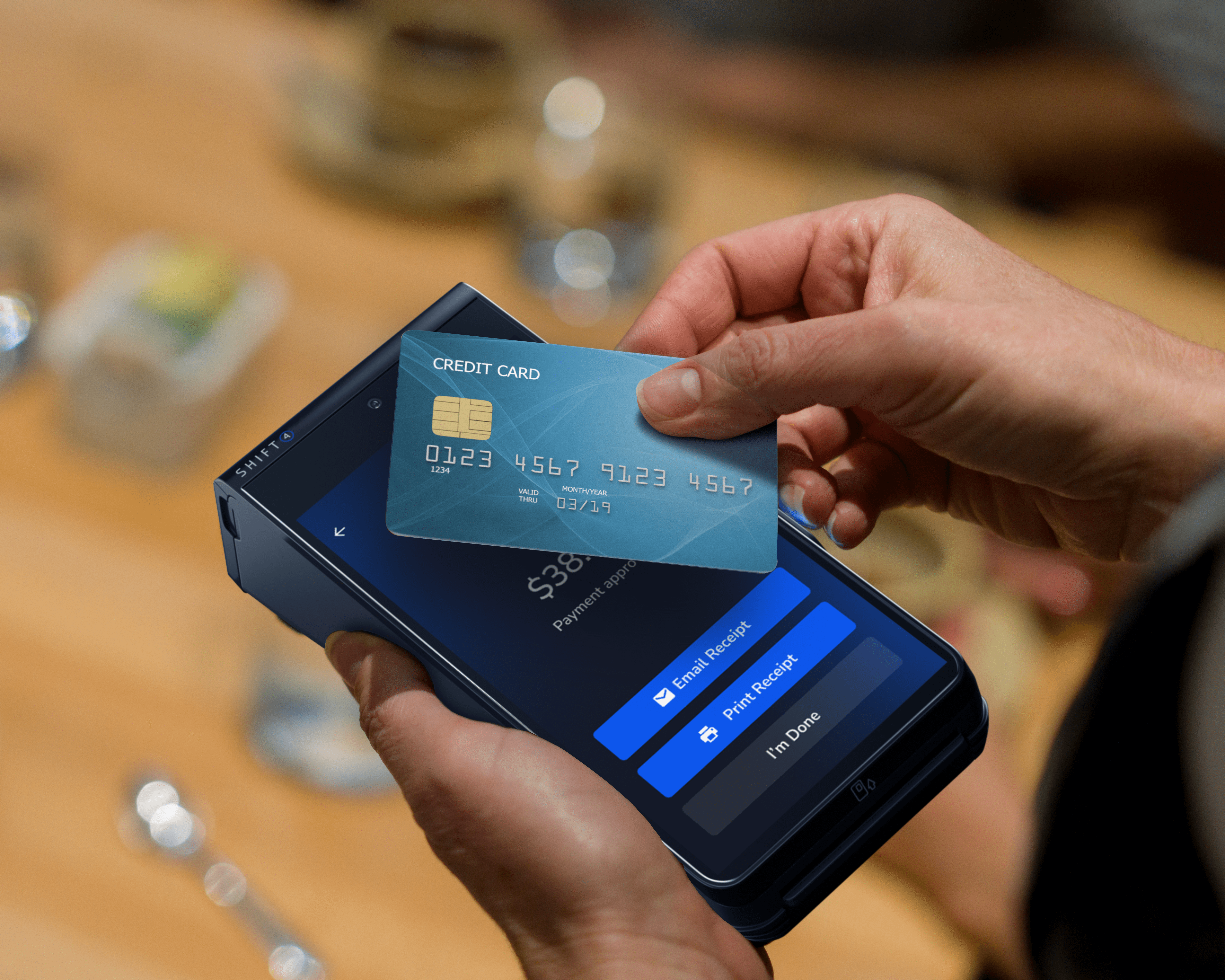 Credit card payment being made on a Shift4 mobile POS device - venue POS system - Shift4