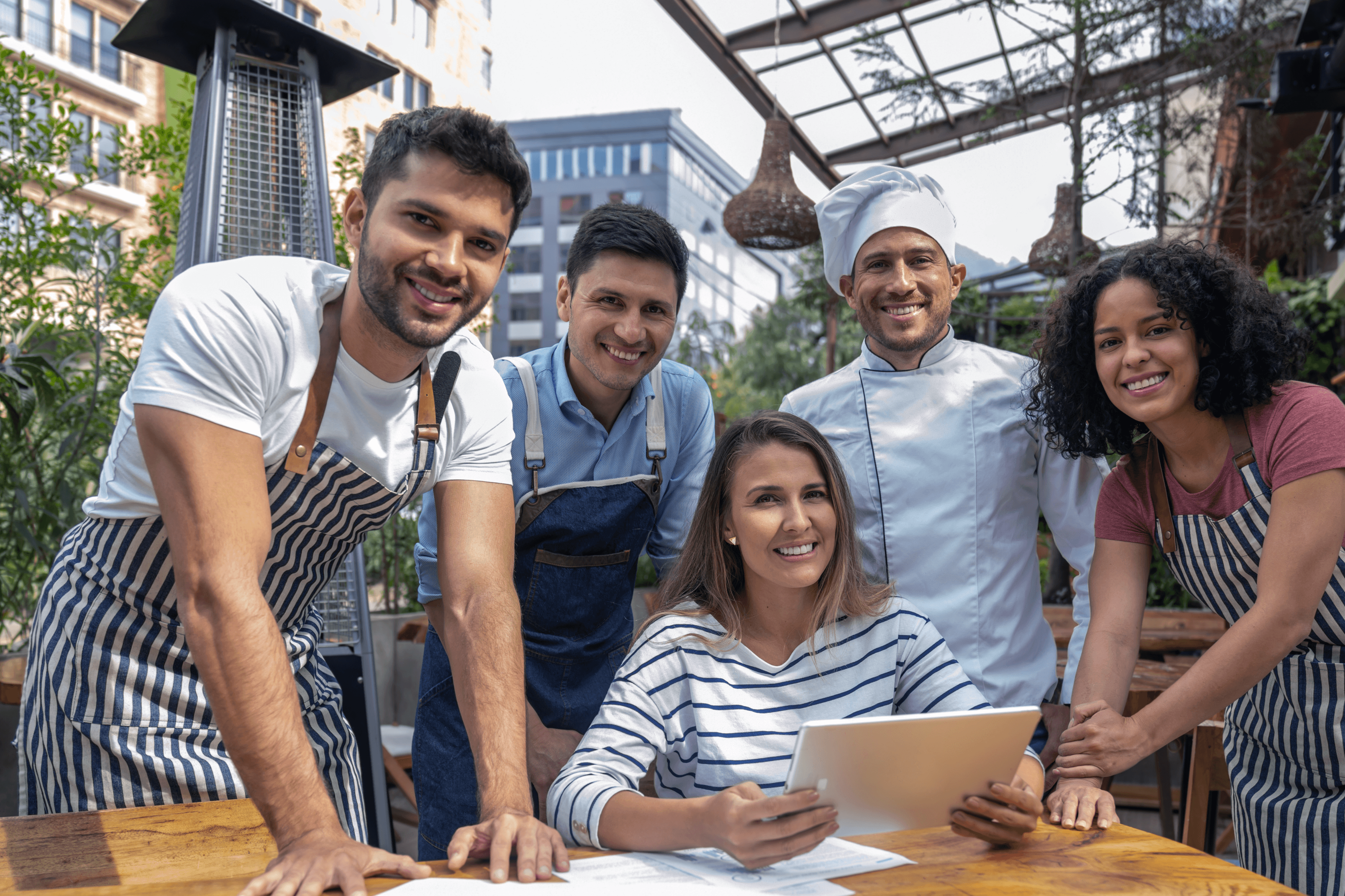 Group of restaurant employees - restaurant labor management - Shift4 Dine