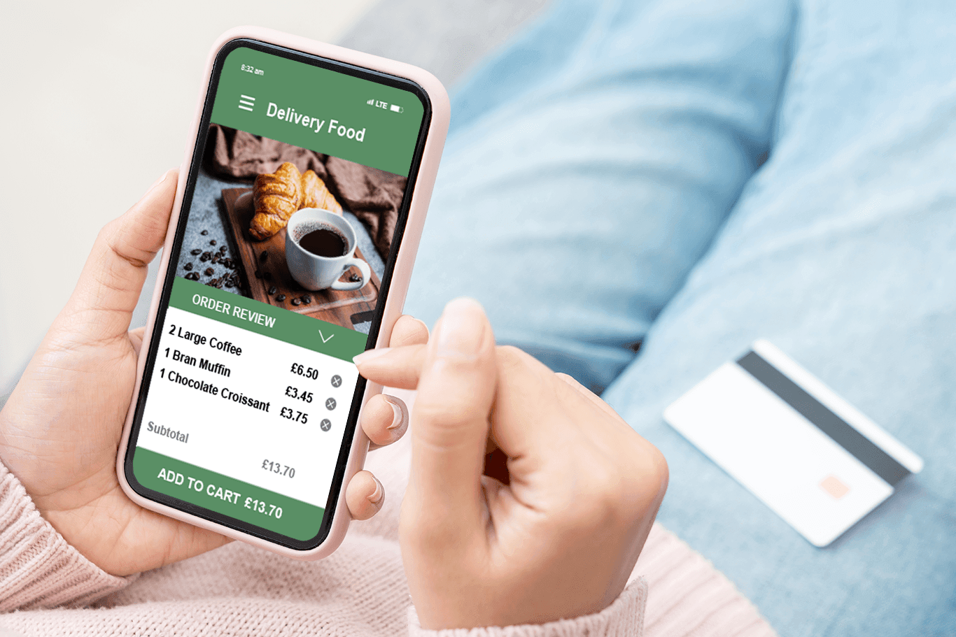 Woman holding a phone showing a screen of an online order for coffee - coffee shop POS system - Shift4 Dine