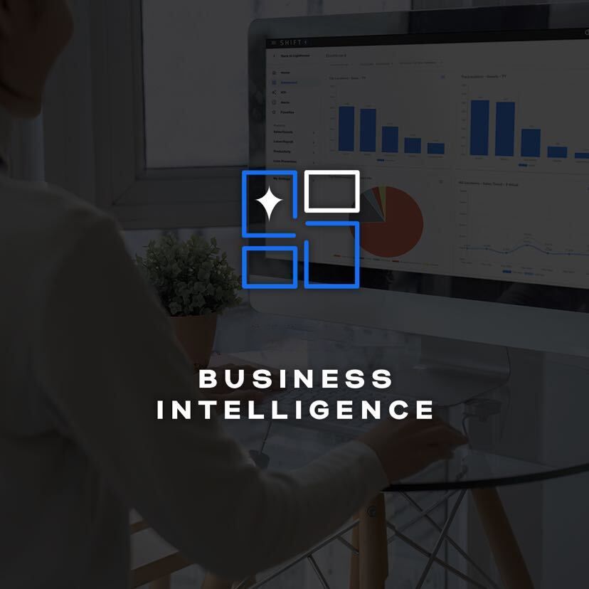 Business Intelligence logo overlayed on an image of a woman looking at reports on a computer - restaurant reporting and analytics - Shift4 Dine