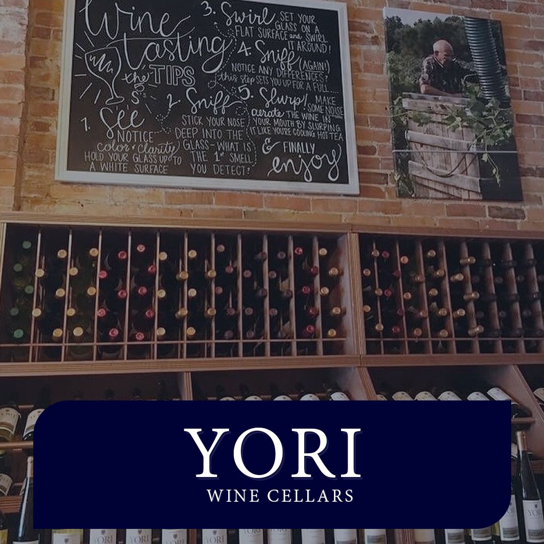 Yori Wine Cellars logo overlayed on a photo of wine bottles - Shift4 POS reviews - Shift4 Dine