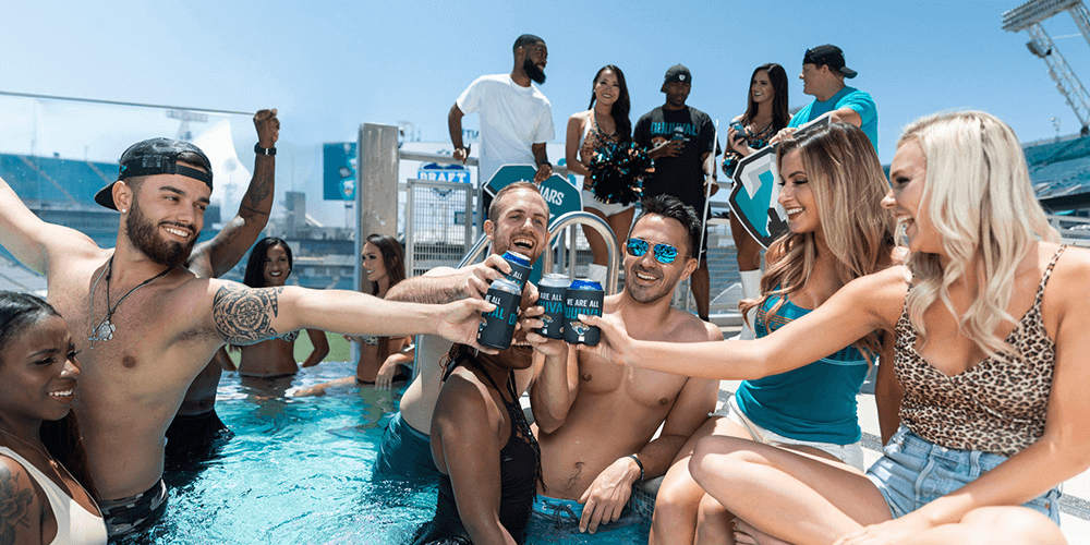 Jacksonville Jaguars fans enjoying a game from a spa cabana - SkyTab referral giveaway