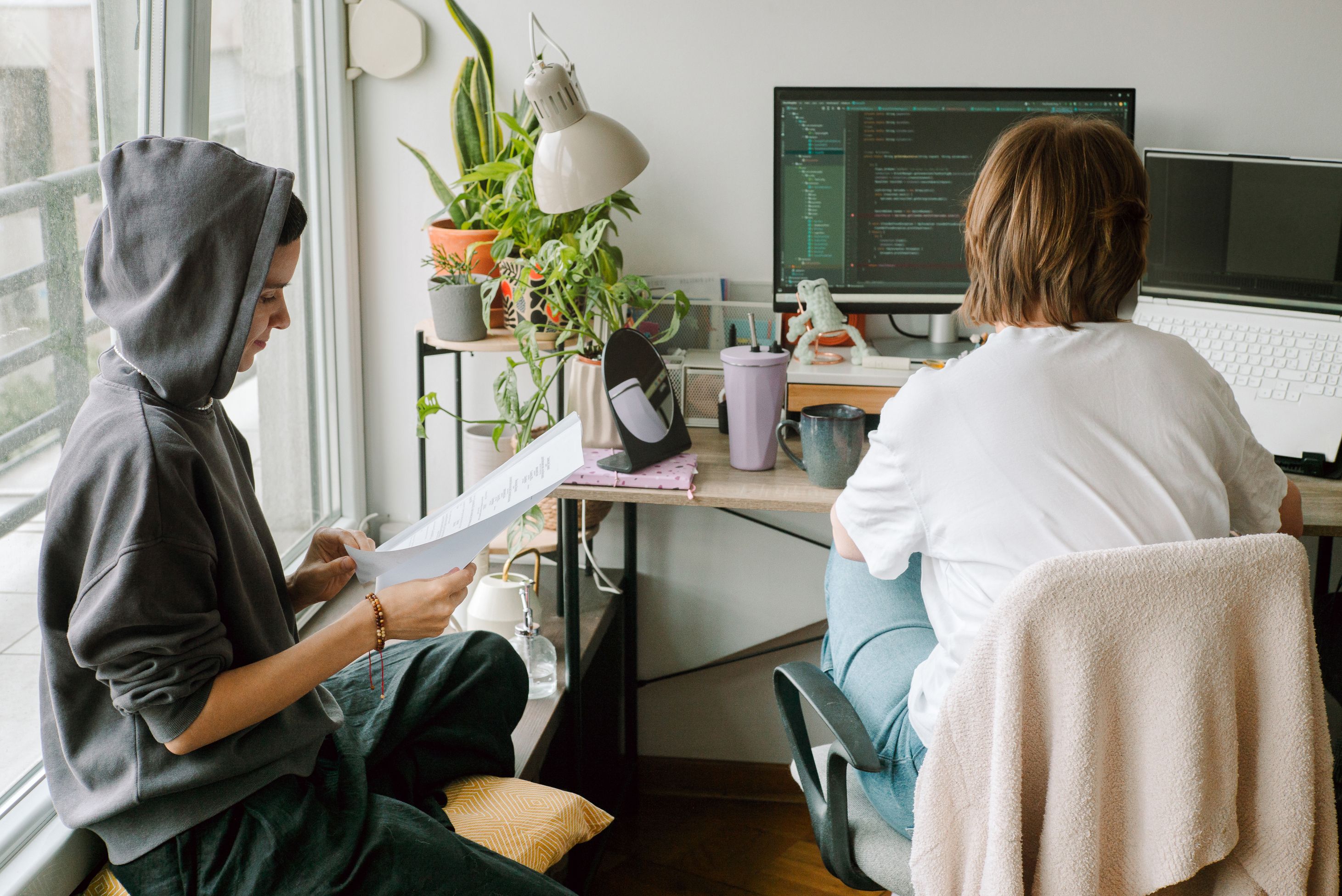 Two women working together on a project