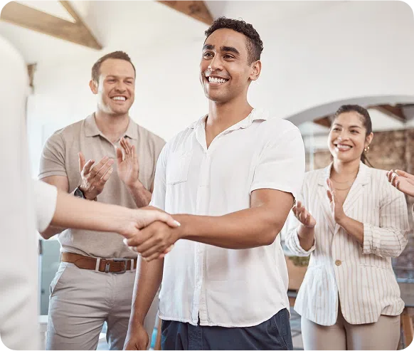 Team congratulating a member