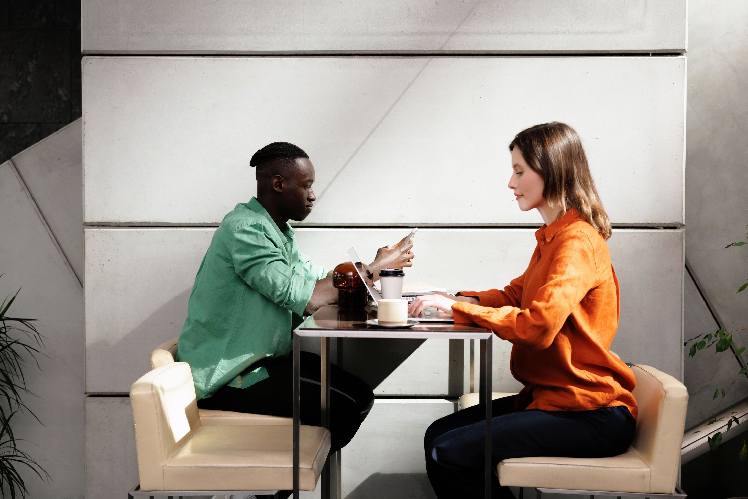 Two people working at a table