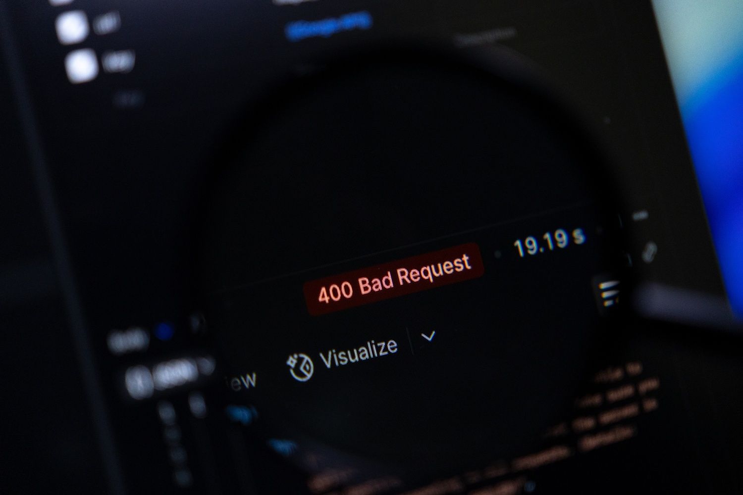 Magnifying glass highlights 400 Bad Request error on dark computer screen, symbolizing web development debugging, network issues, and IT system troubleshooting