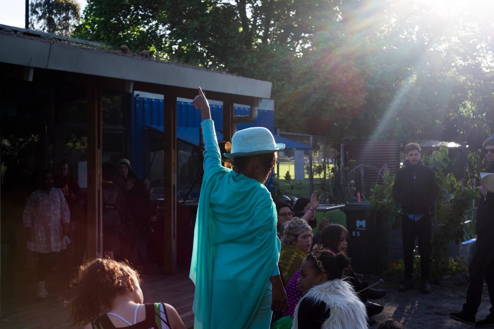 A performance by young people in late afternoon sun as part of Chamber Made's The Venny Imagine a Place 2017