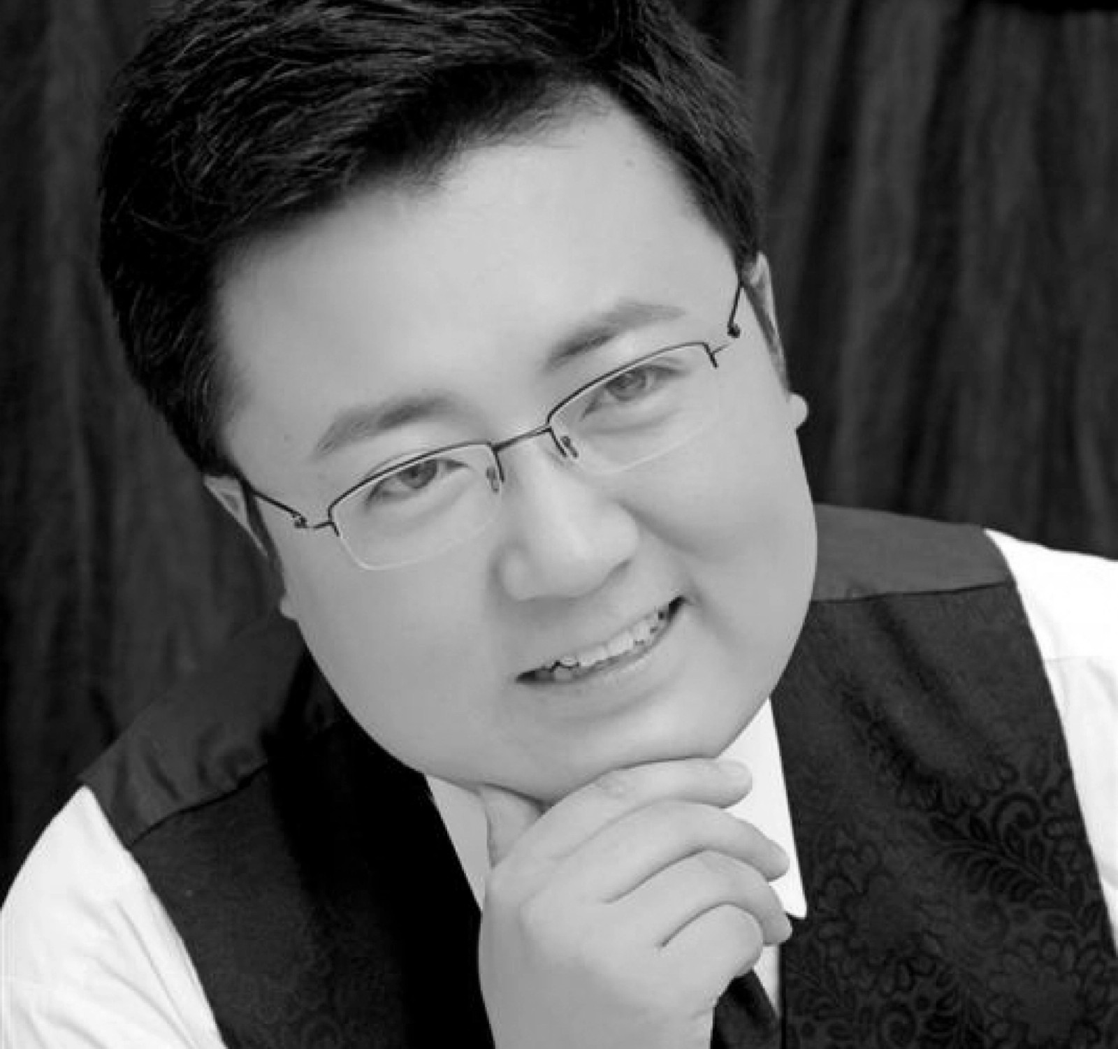 Headshot of Kang Yan-Long